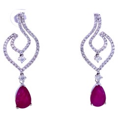 Orecchini di rubini con diamanti in oro bianco 14K