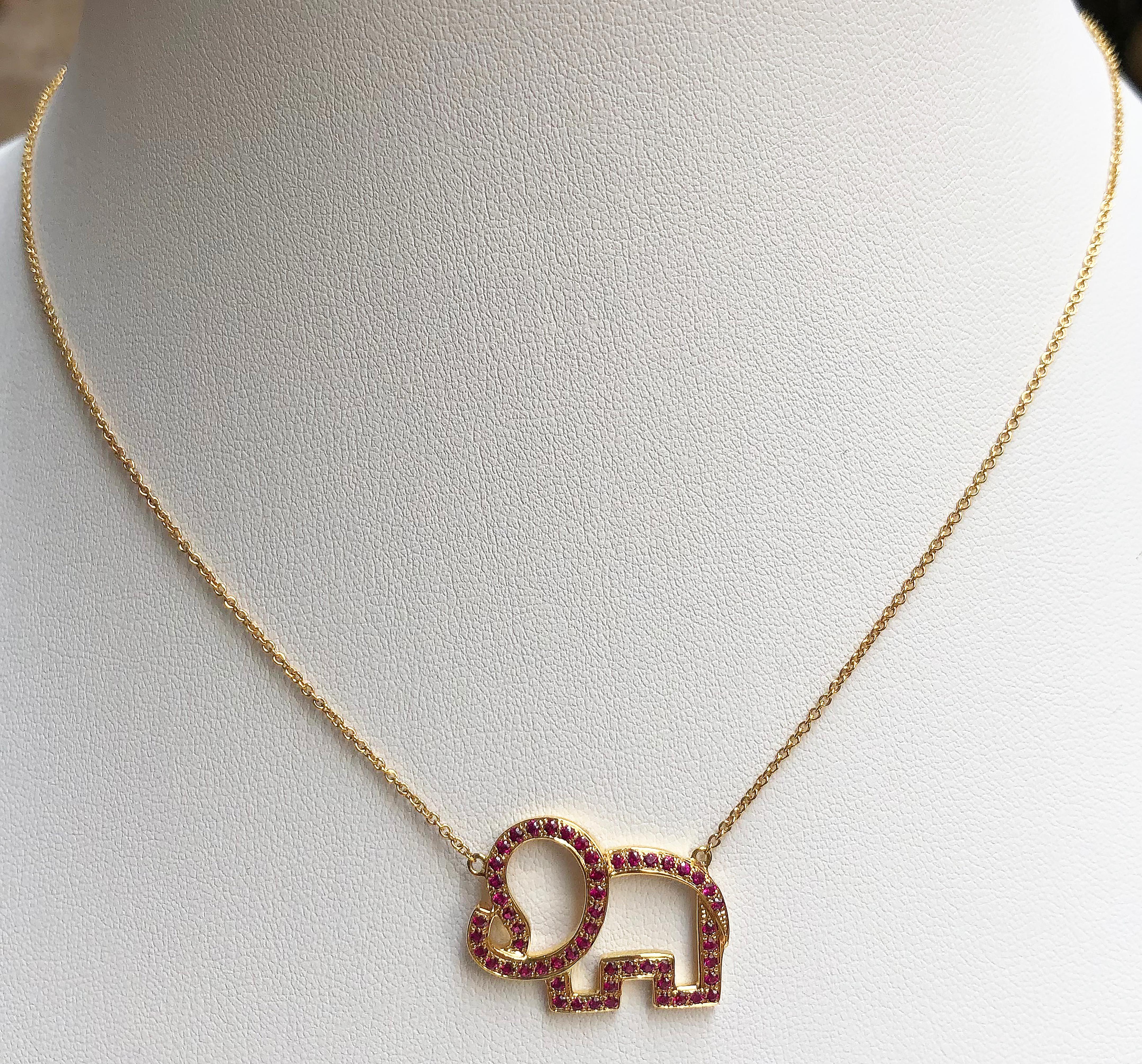 Ruby 0.71 carat Elephant Necklace set in 18 Karat Gold Settings

Width:  2.5 cm 
Length: 42.5 cm
Total Weight: 4.98 grams

