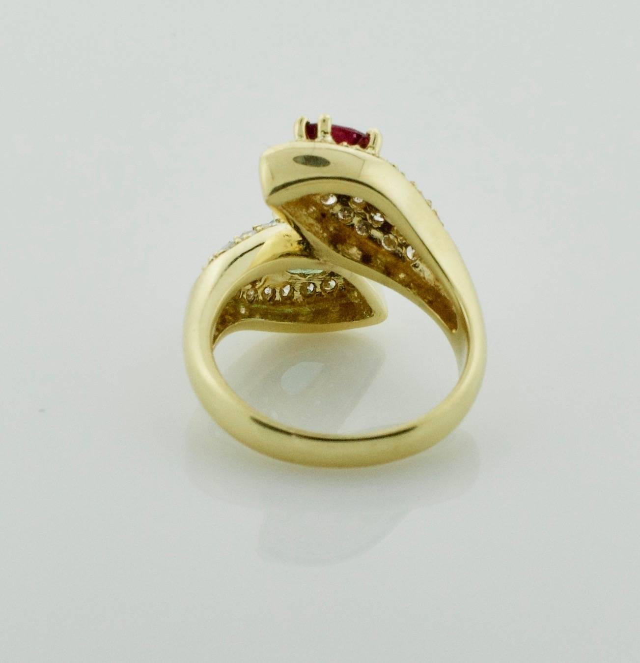 Ruby, Emerald and Diamond Crossover Ring in 18 Karat Yellow Gold In Excellent Condition In Wailea, HI