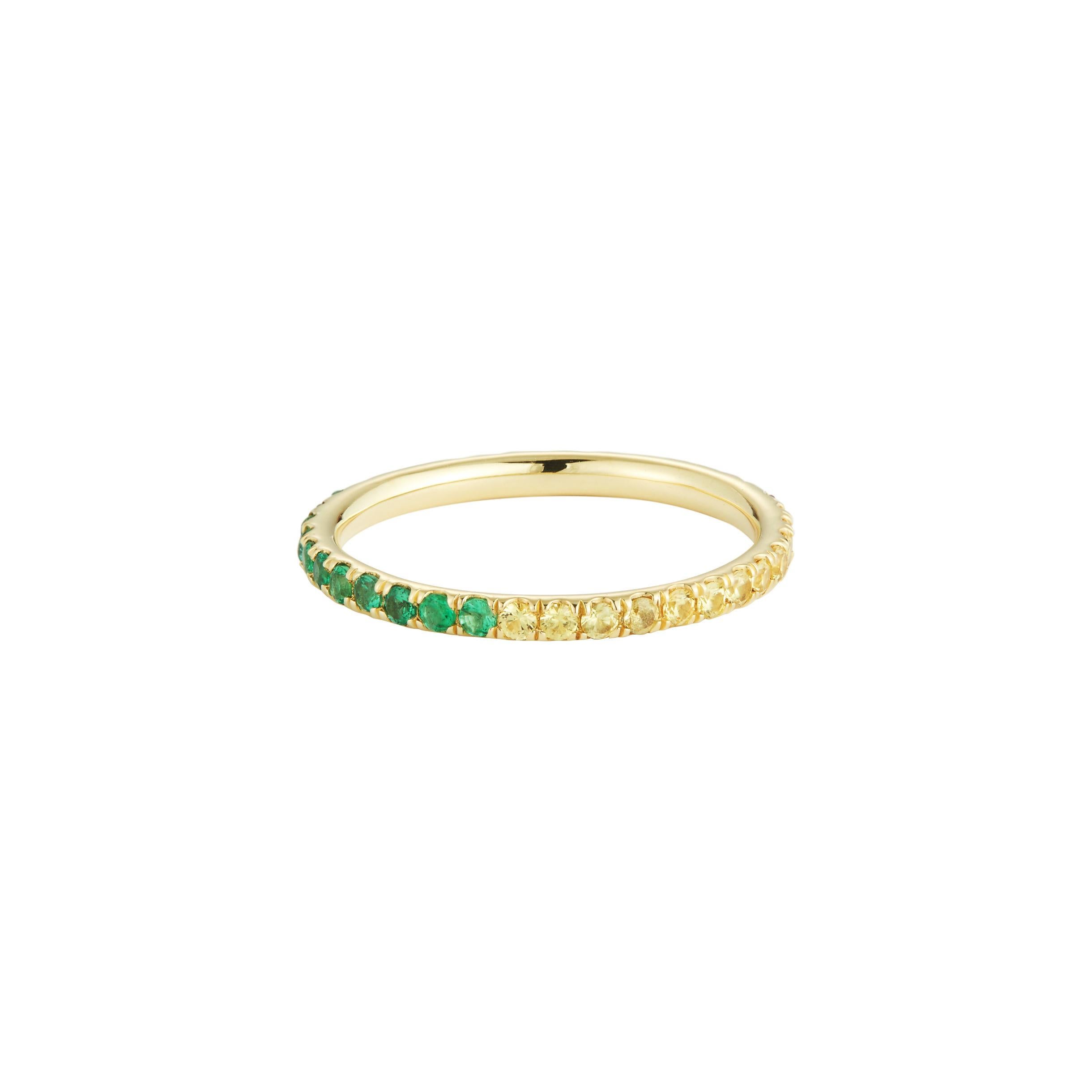 Inspired by the musical genre (yes!), the Ska eternity band showcases 0.19 carats of emeralds, 0.25 carats of rubies, and 0.25 carats of yellow sapphires in a scoop setting. The stones are set in 18 karat yellow gold. 

NB: All of our jewelry is
