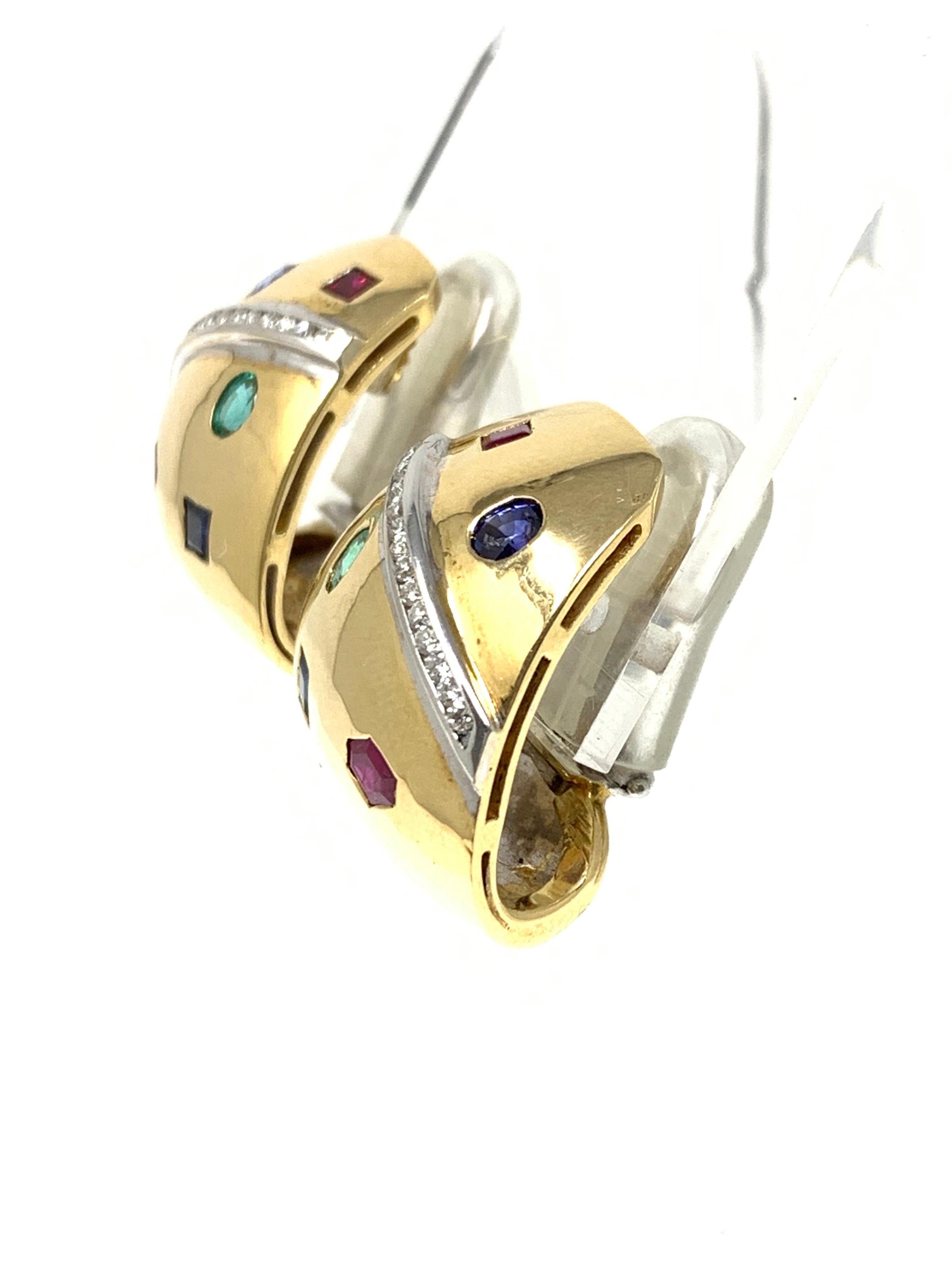 Ruby, emerald , blue sapphire and diamond studs are handcrafted in 18 k yellow gold. 
The details are as follows : 
Diamond weight : 0.50 carat 
color stone weight : 4 carat 
Metal : 18 K Yellow Gold 
