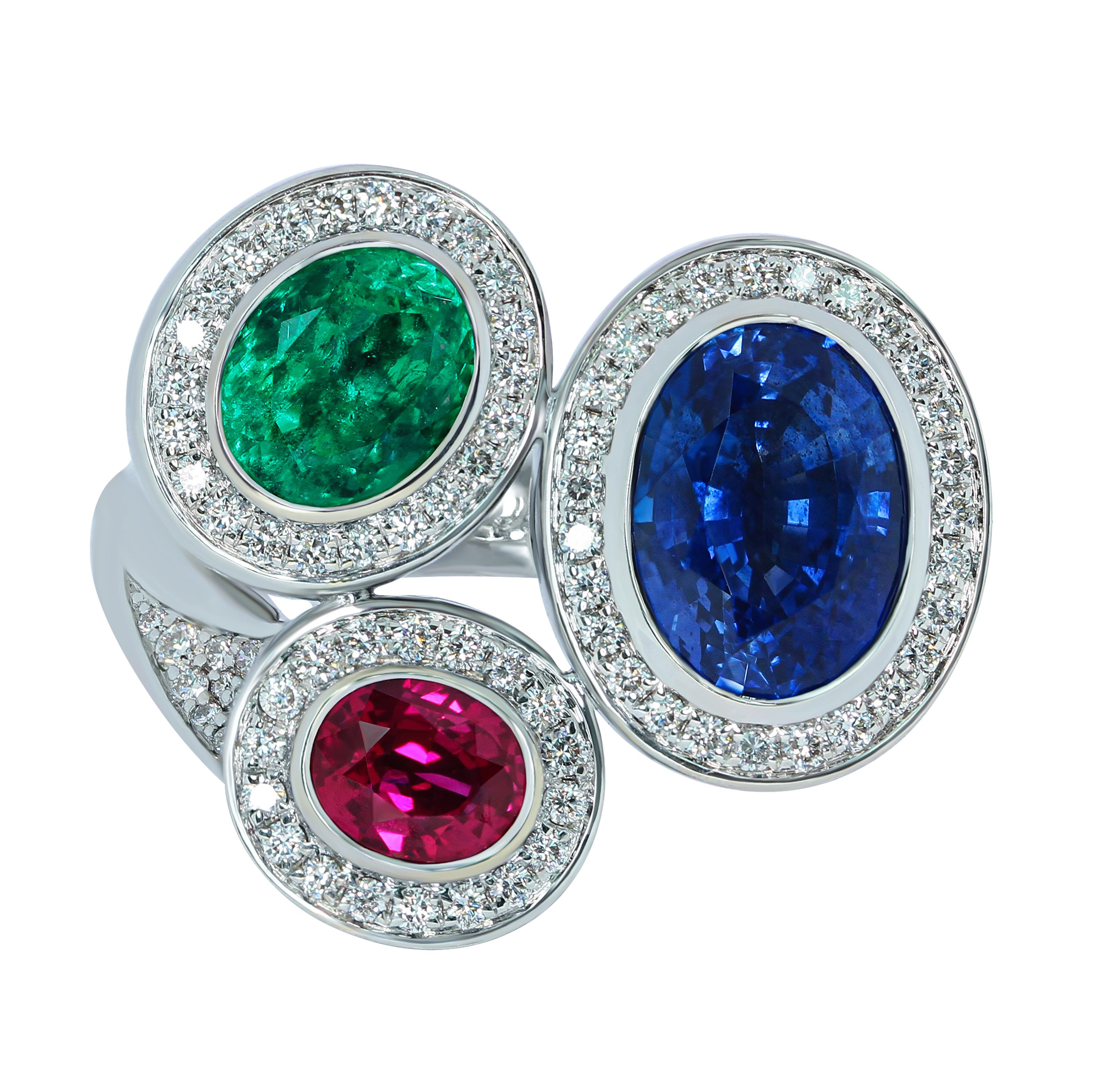 Ruby Emerald Blue Sapphire Diamonds 18 Karat White Gold Trio Ring
Sparkling combination of style and colour. The Ring «TRIO», from High Jewelry collection, is made of White 18 Karat White Gold, decorated with 141 Diamonds and three most popular
