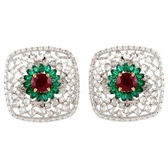 Clous d'oreilles en or 18 carats avec rubis, émeraude et diamants