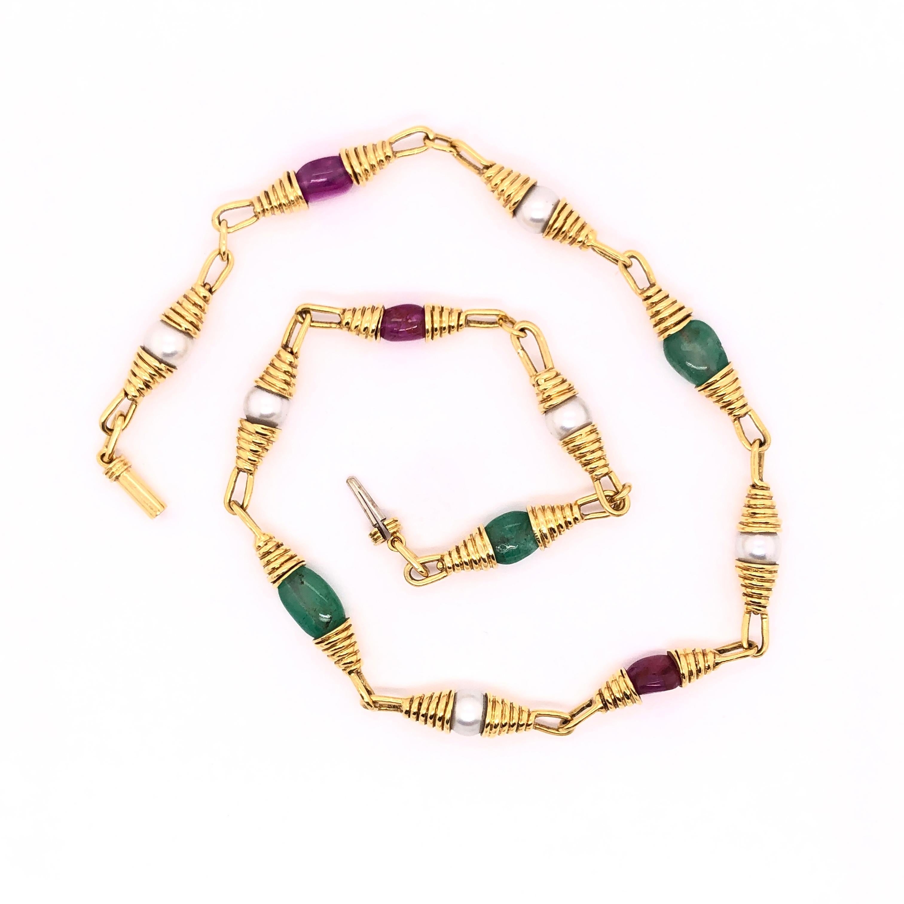 This versatile and unique necklace can be worn with your favorite pair of jeans or dress. The estimated 9.25 CTW of rubies, estimated 10 CTW of emeralds and six 7mm pearls are a sure conversation starter. At 17 inches the necklace rests nicely on