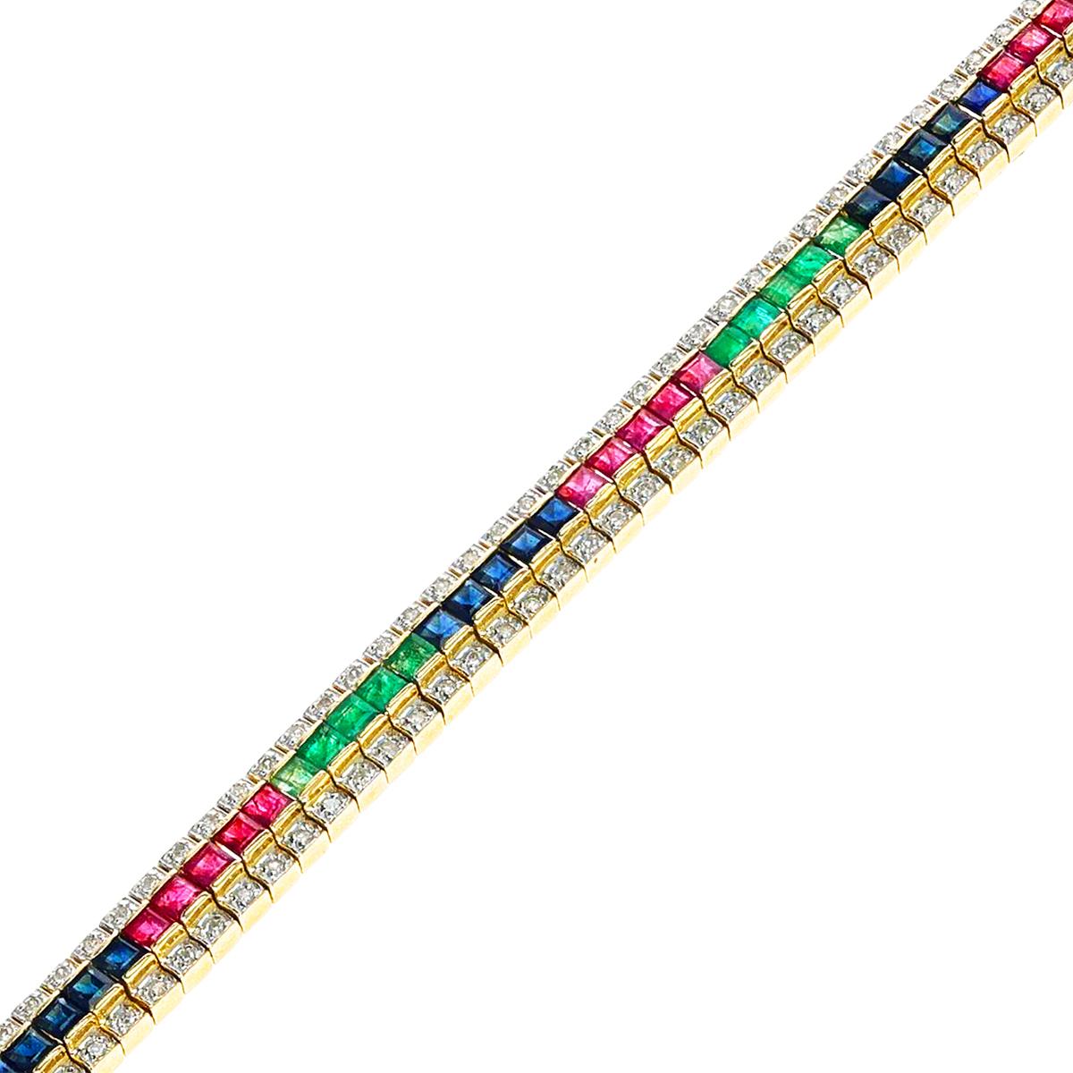 A Ruby, Emerald, Sapphire and Diamond Bracelet made in 14k Yellow Gold. The length of the bracelet is 7.25 inches. The total weight of the bracelet is 24.63 grams. 