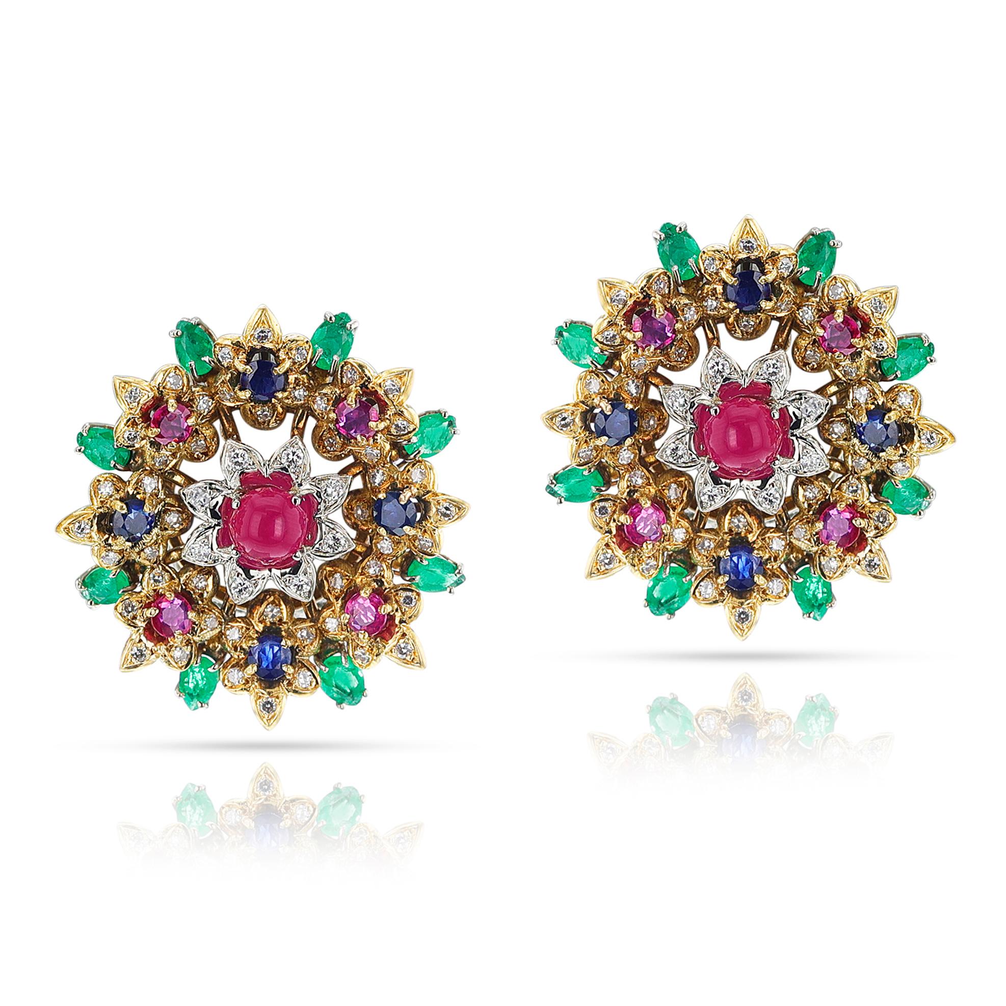 A pair of Ruby, Emerald, Sapphire and Diamond Large Flower Earrings made in 18k Yellow Gold. The colored stones weigh appx. 11 carats, and the diamonds weigh appx. 2 carats with F/G color and VS2 clarity. The length is 1.30 inches. The total weight