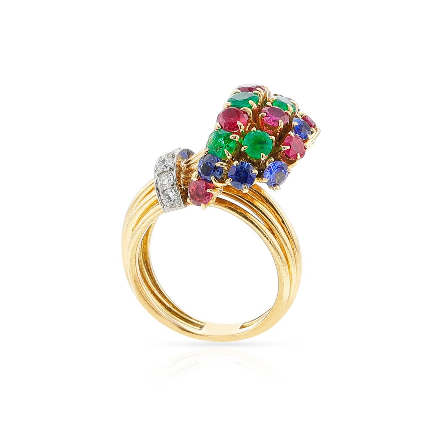 A Ruby, Emerald, Sapphire, Diamond Cocktail Ring made in 18k. The diamonds appx. weigh 0.35 carats. The ring size is 5 3/4. French assay marks. Made in Platinum and 18k gold. The diamonds are H-I color, VS-SI clarity.

1494-FEJRTL