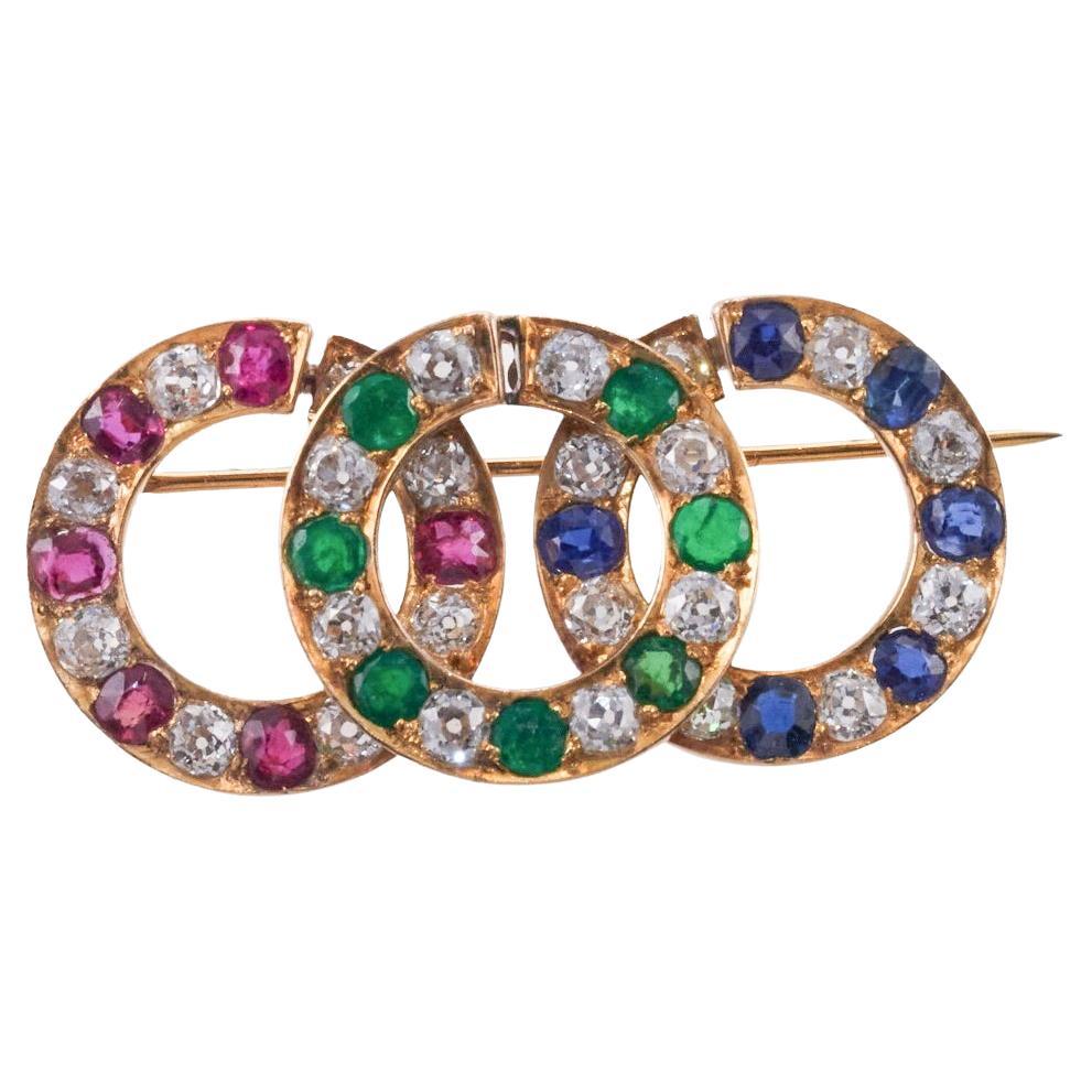 Ruby Emerald Sapphire Old Mine Cut Diamond Gold Circle Brooch  For Sale