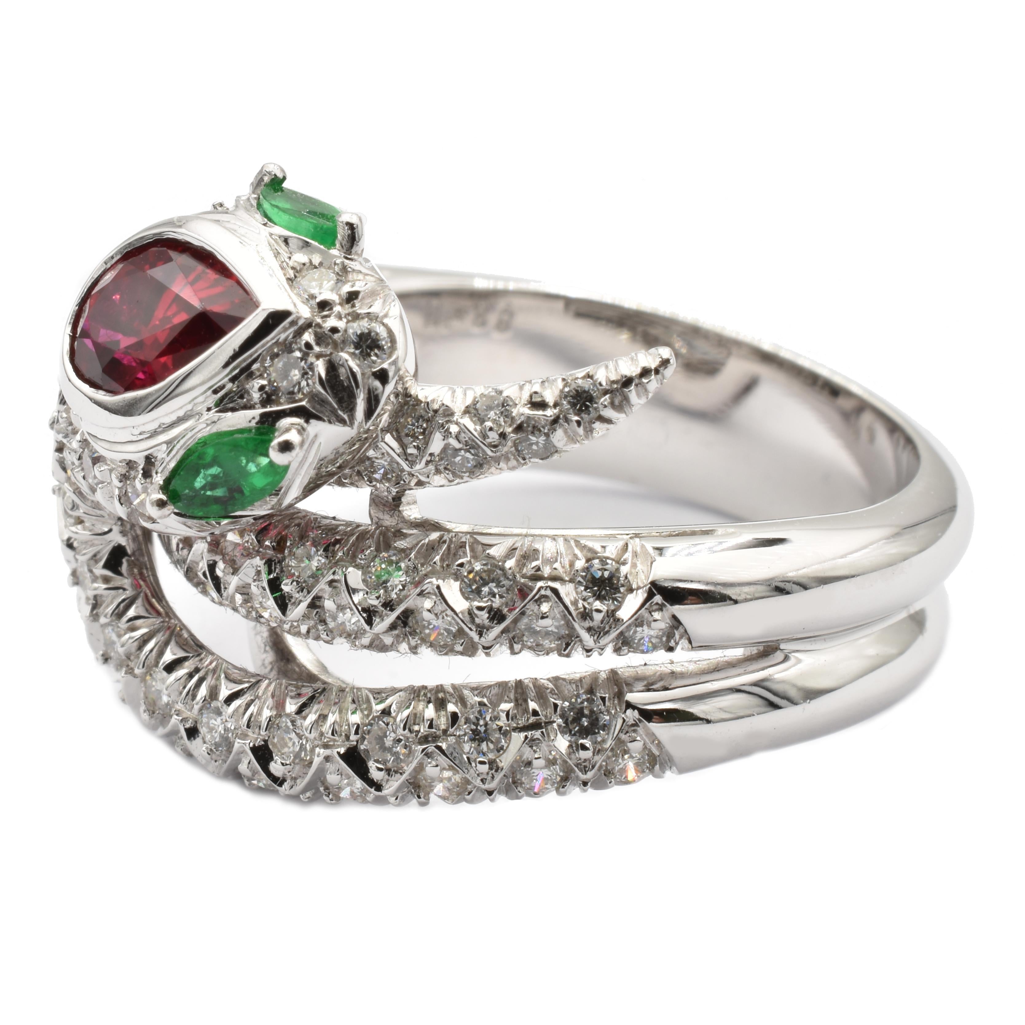 Gilberto Cassola 18Kt White Gold Snake Ring with a Pear Ruby, two Marquise Emeralds and Diamonds.
Handmade in our Atelier in Valenza Italy.
Intense Red Natural Ruby Pear sized mm 7.50 X 4.80. Weight ct 0,70
Two  Bright Green Natural Emerald