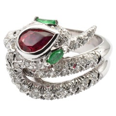Anillo serpiente de oro blanco con rubíes, esmeraldas y diamantes Hecho en Italia