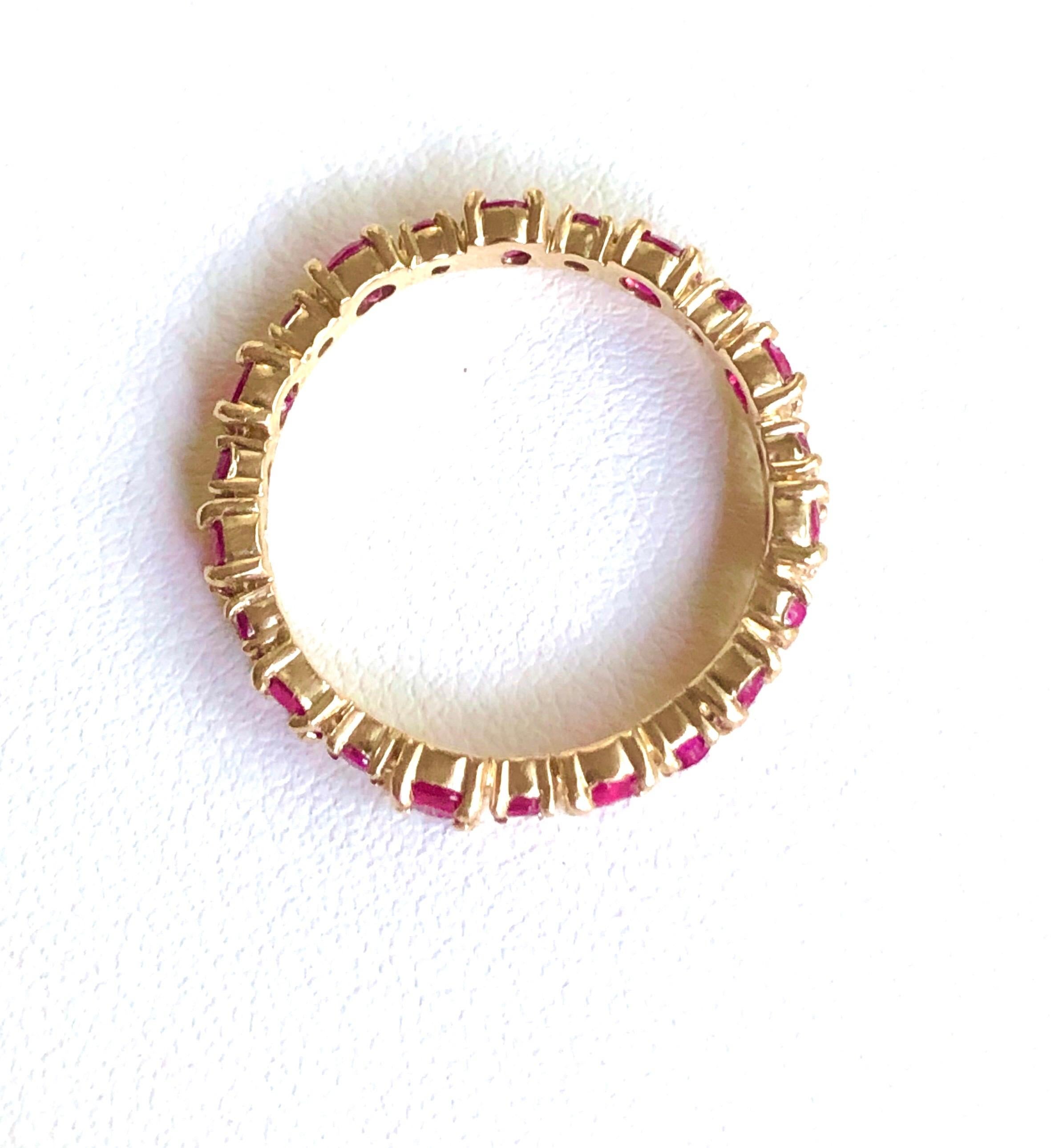 Contemporary Ruby Engagement Eternity Yellow Gold Band Ring