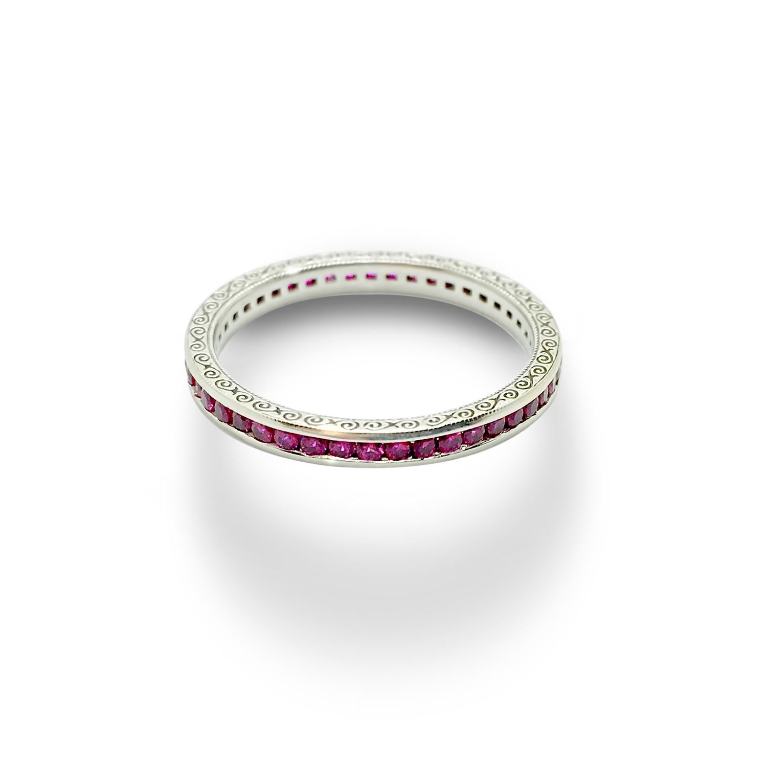 Experience everlasting love and celebrate cherished moments with our Ruby Eternity Band in 14k White Gold. This remarkable ring captures the essence of eternal bliss and serves as a symbol of unending devotion.

Crafted with meticulous care, this