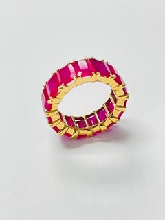 Ruby Eternity Band In 18 Karat Yellow Gold.
