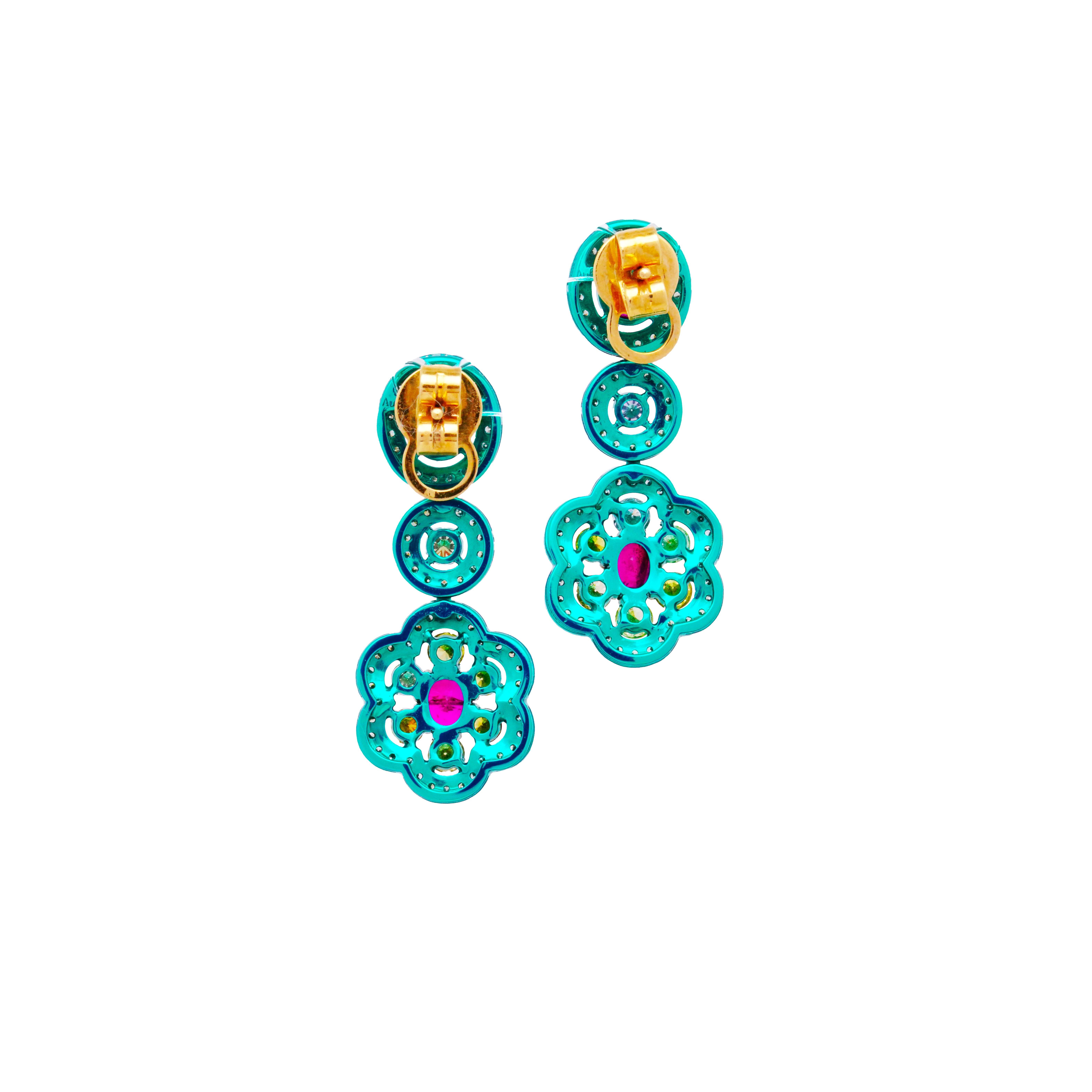 This vibrant and unique pair of earrings by Austy Lee is made of Mozambican Rubies and Fancy Color Diamonds, set on green color-plated 18K Yellow Gold. The pair is perfect for daily wear, in either casual or formal occasion.

Product