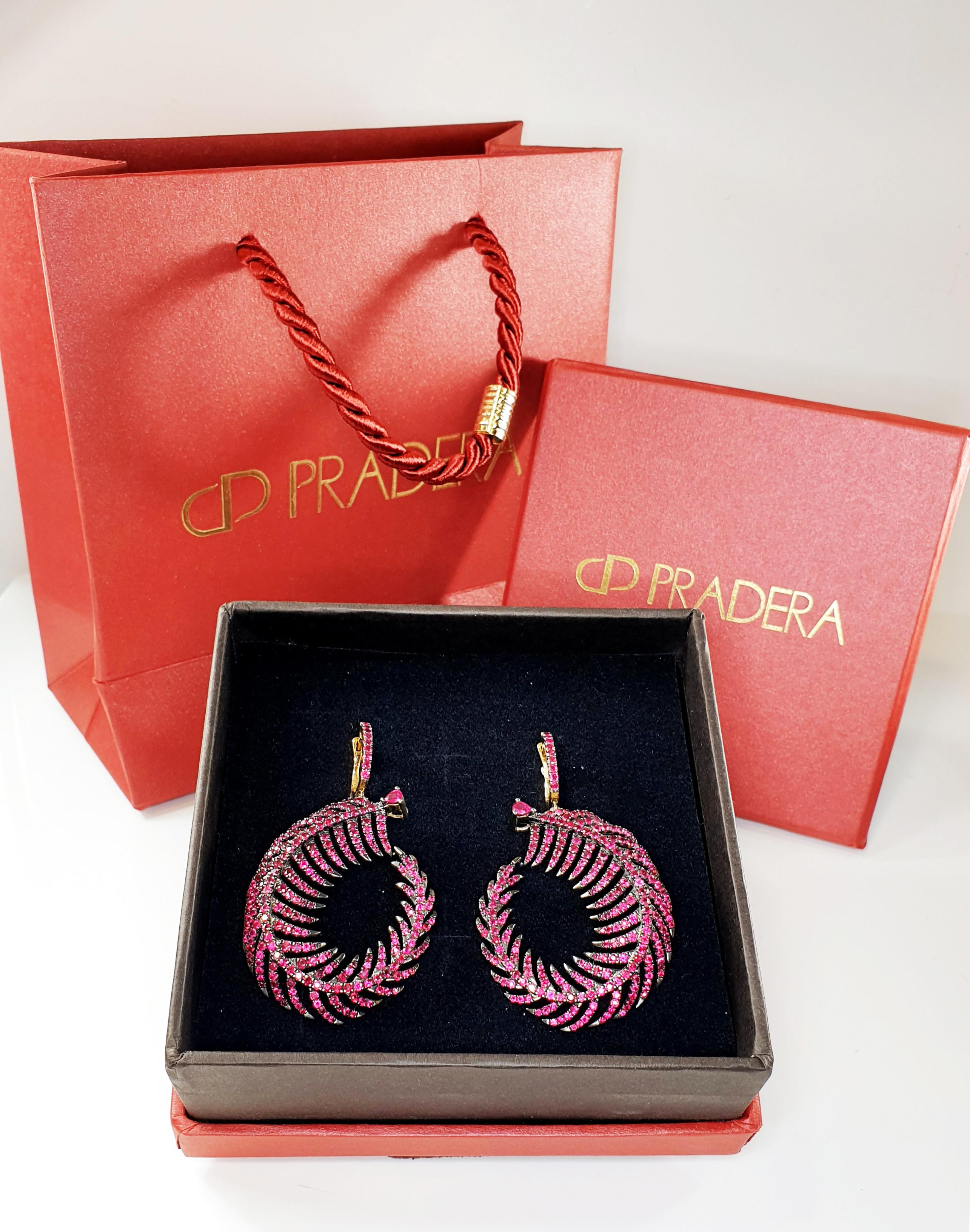 Contemporary Ruby Feather Twister Hoop Earrings For Sale