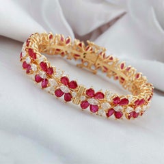 Bracciale con gemme di rubino e diamanti H. H. Bracciale con diamanti in oro giallo 18 carati