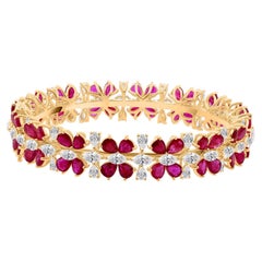 Bracciale con gemme di rubino e diamanti H. H. Bracciale con diamanti in oro giallo 18 carati