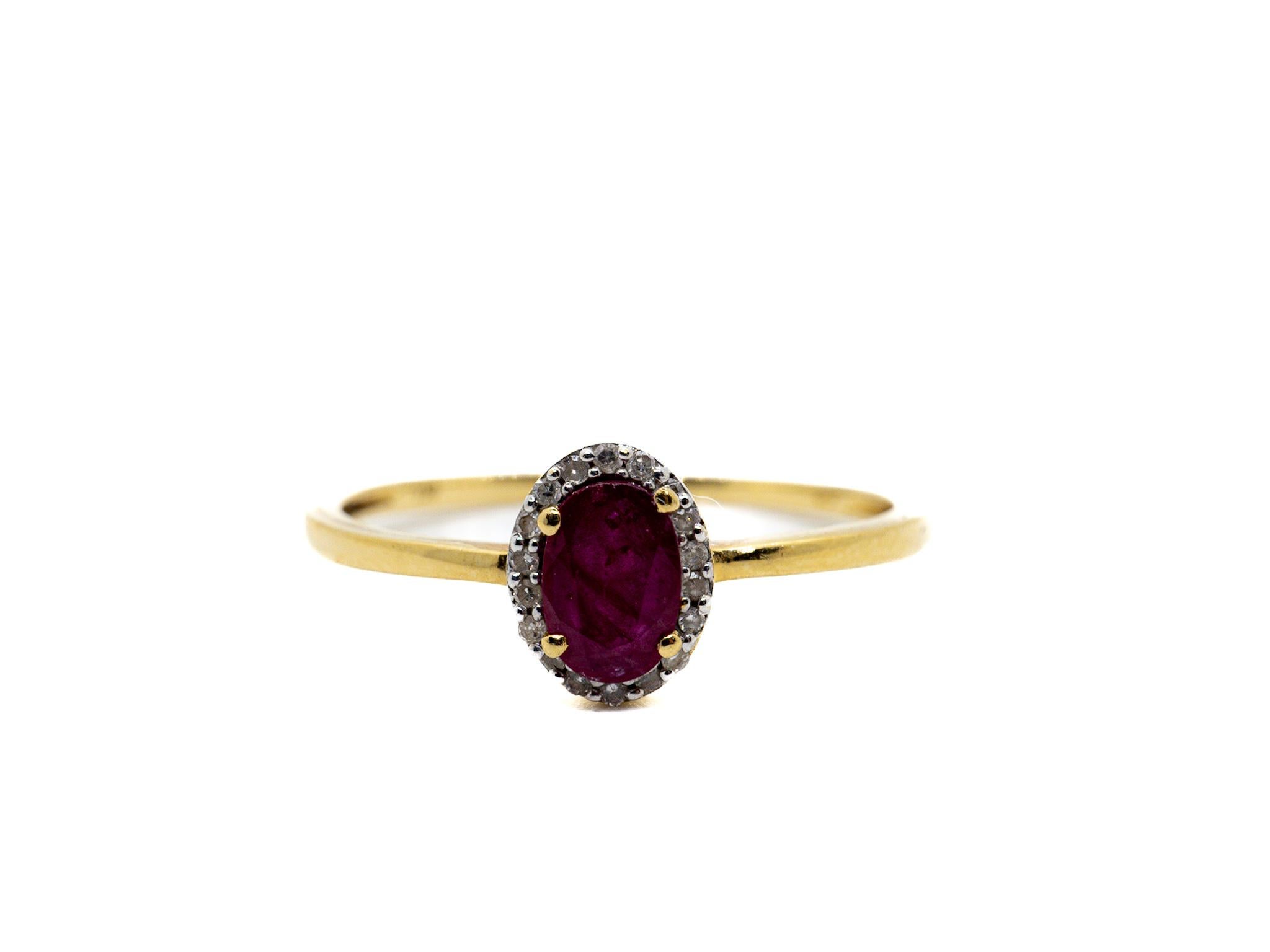 Introducing our exquisite Halo Ruby Ring, a true embodiment of elegance and sophistication. Handcrafted with precision and care, this stunning ring is made of luxurious 18K yellow gold, radiating a warm and timeless glow.

At the center of the ring,
