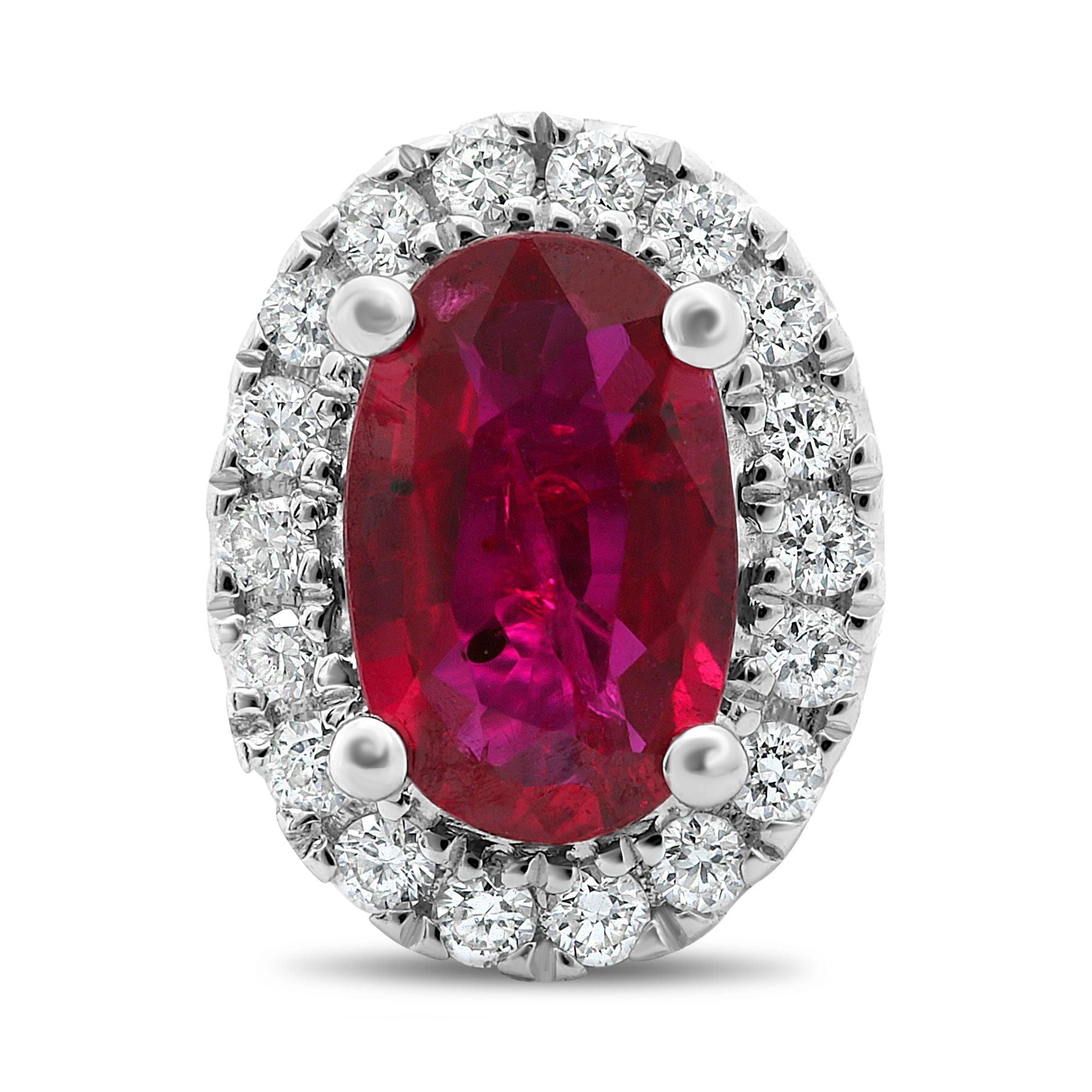 At the center of these eye-catching 18 karat white gold stud earrings rest 1.28 carats of brilliant oval cut rubies. A sparkling halo of white diamonds surrounds each center stone with a total weight of 0.16 carats of round cut white diamonds