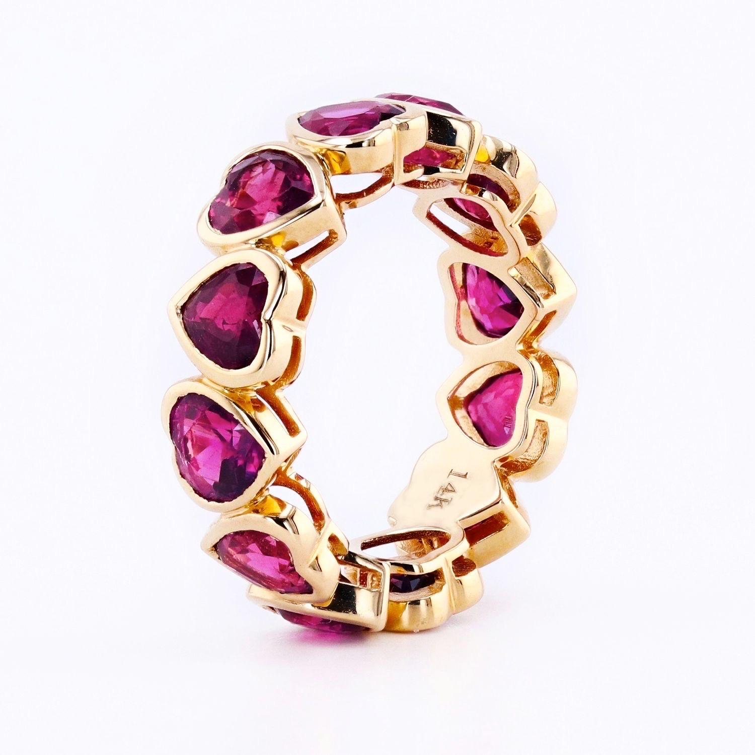 Natural Ruby Heart Band bezel set in 14k yellow gold. This band is so fun to add a pop of color to any outfit. 