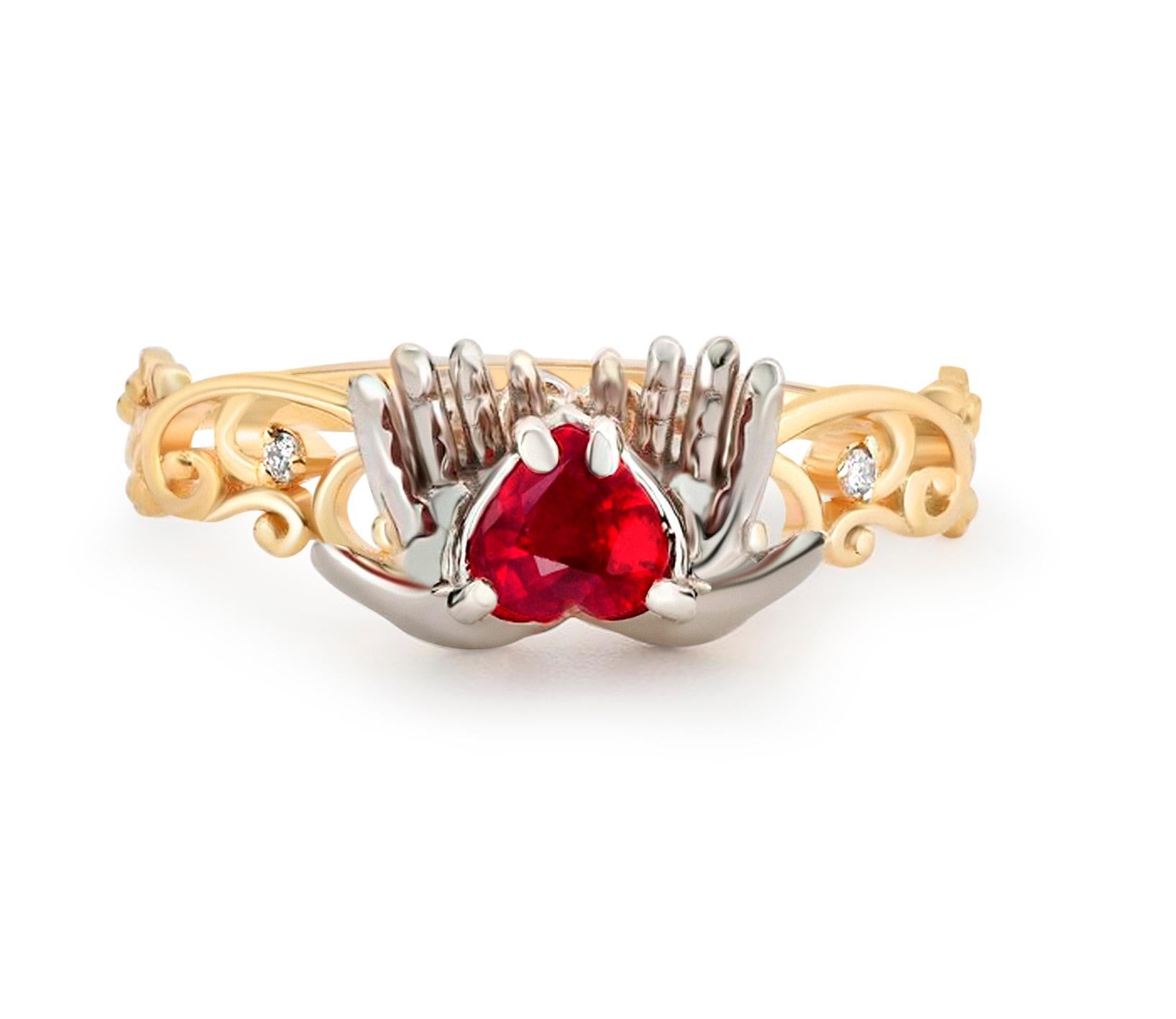 Ruby heart in hands 14k gold ring. 
Heart ruby ring. July birthstone ring. Ruby engagement ring. Red heart in hands ring. Valentine day gift.

14 kt white and yellow gold.
Weight: 2.10 g. depends from size.

Set with ruby, color - red
Heart cut,