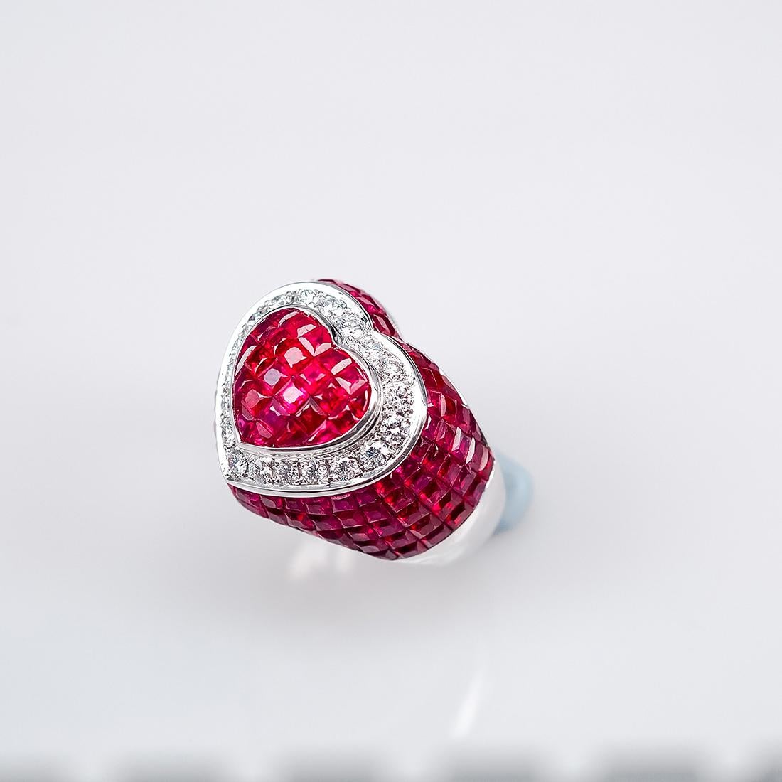 The top quality ruby which make in invisible setting.We set the stone in perfection as we are professional in this kind of setting more than 40 years.The invisible is a highly technique .We cut and groove every stone .Therefore; we can guarantee the