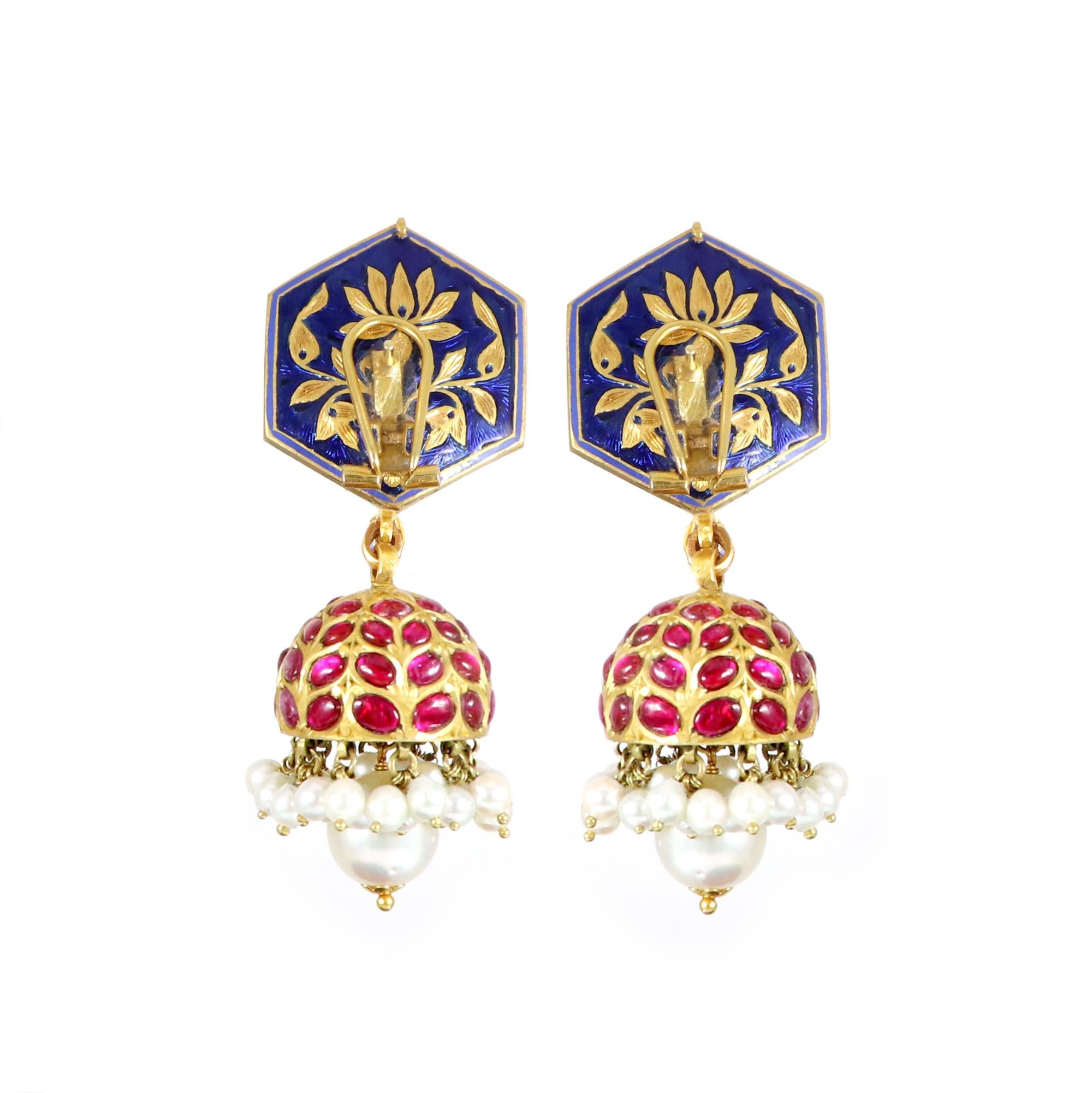 Discover our exquisite collection of Ruby Jhumki earrings, adorned with uncut diamonds that are crafted in 18K yellow gold. These stunning pieces are a true testament to timeless elegance and luxury, designed to captivate attention and exude