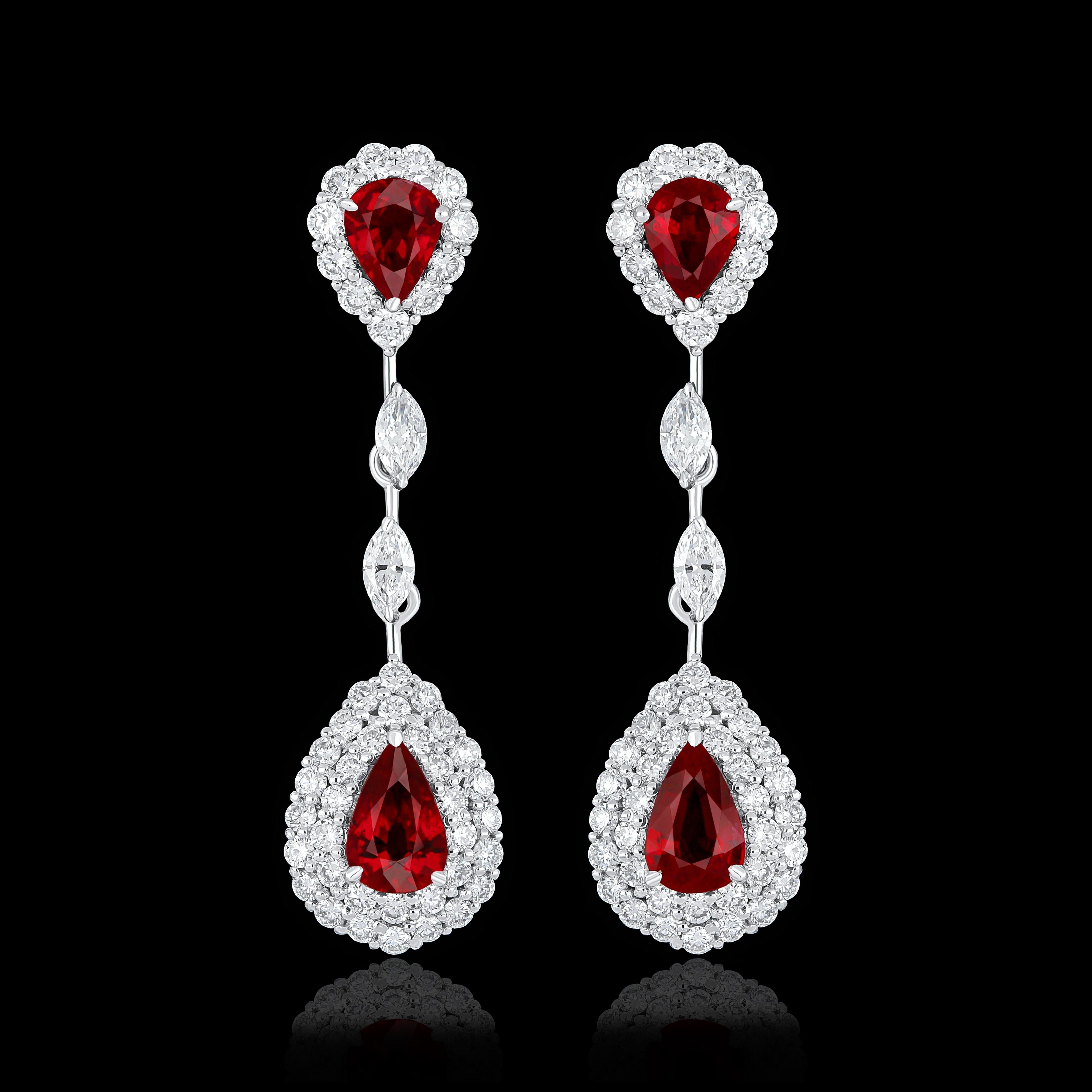 Elegant and exquisitely detailed 18 Karat White Gold Earring, set with total 1.3 Cts .Pear Shape Mozambique Ruby and micro pave set Diamonds, weighing approx. 1.21Cts Beautifully Hand crafted in 18 Karat White Gold.

Stone Detail: 
Ruby Mozambique: