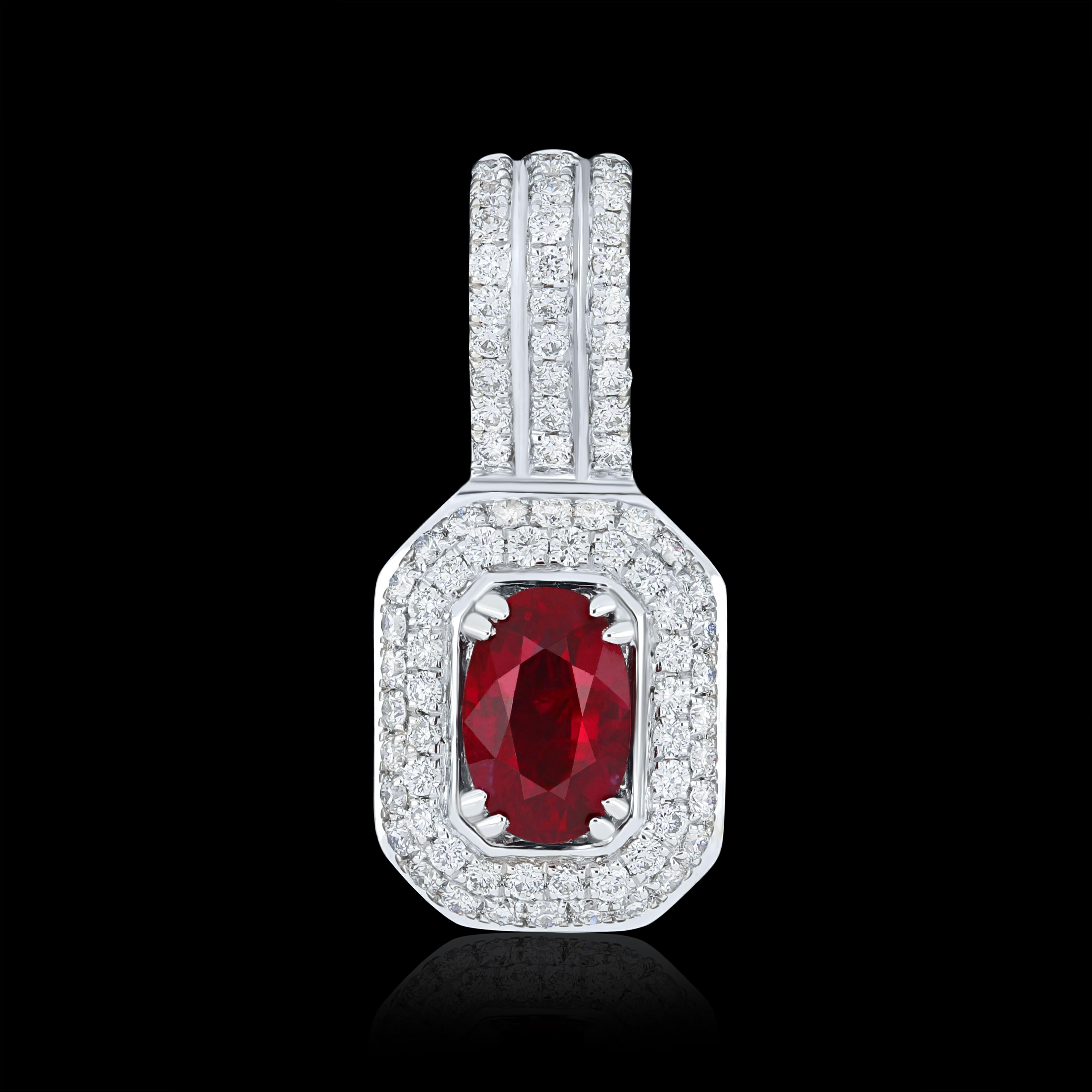 Elegant and exquisitely detailed 18 Karat White Gold Pendant, center set with 0.55 Cts .Oval Shape Ruby Mozambique and micro pave set Diamonds, weighing approx. 0.29 Cts Beautifully Hand crafted in 18 Karat White Gold.

Stone Detail:
Ruby