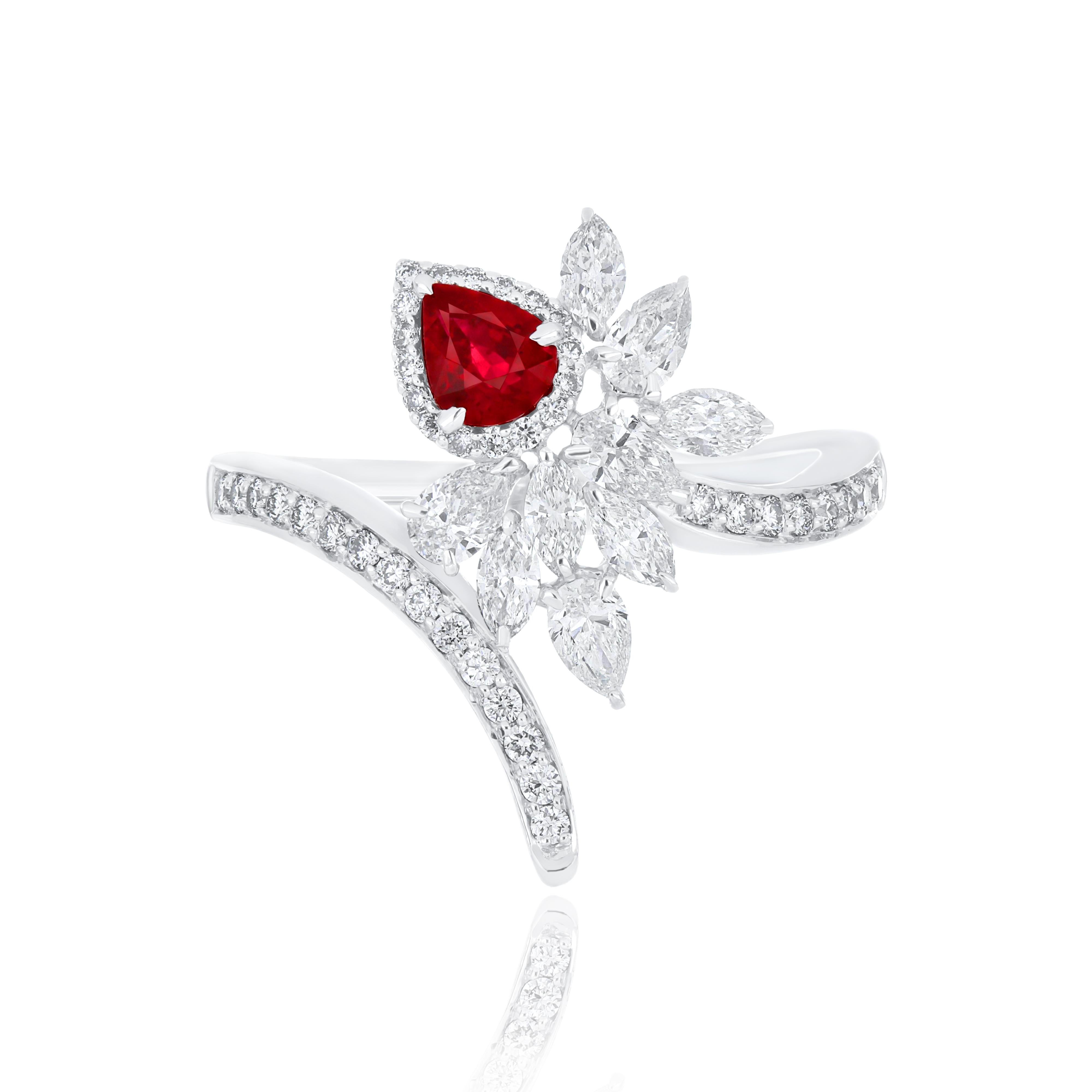 Elegant and exquisitely detailed 18 Karat White Gold Ring, center set with 0.37 Cts .Pear Shape Ruby Mozambique and micro pave set Diamonds, weighing approx. 0.94 Cts Beautifully Hand crafted in 18 Karat White Gold.

Stone Detail:
Ruby Mozambique: