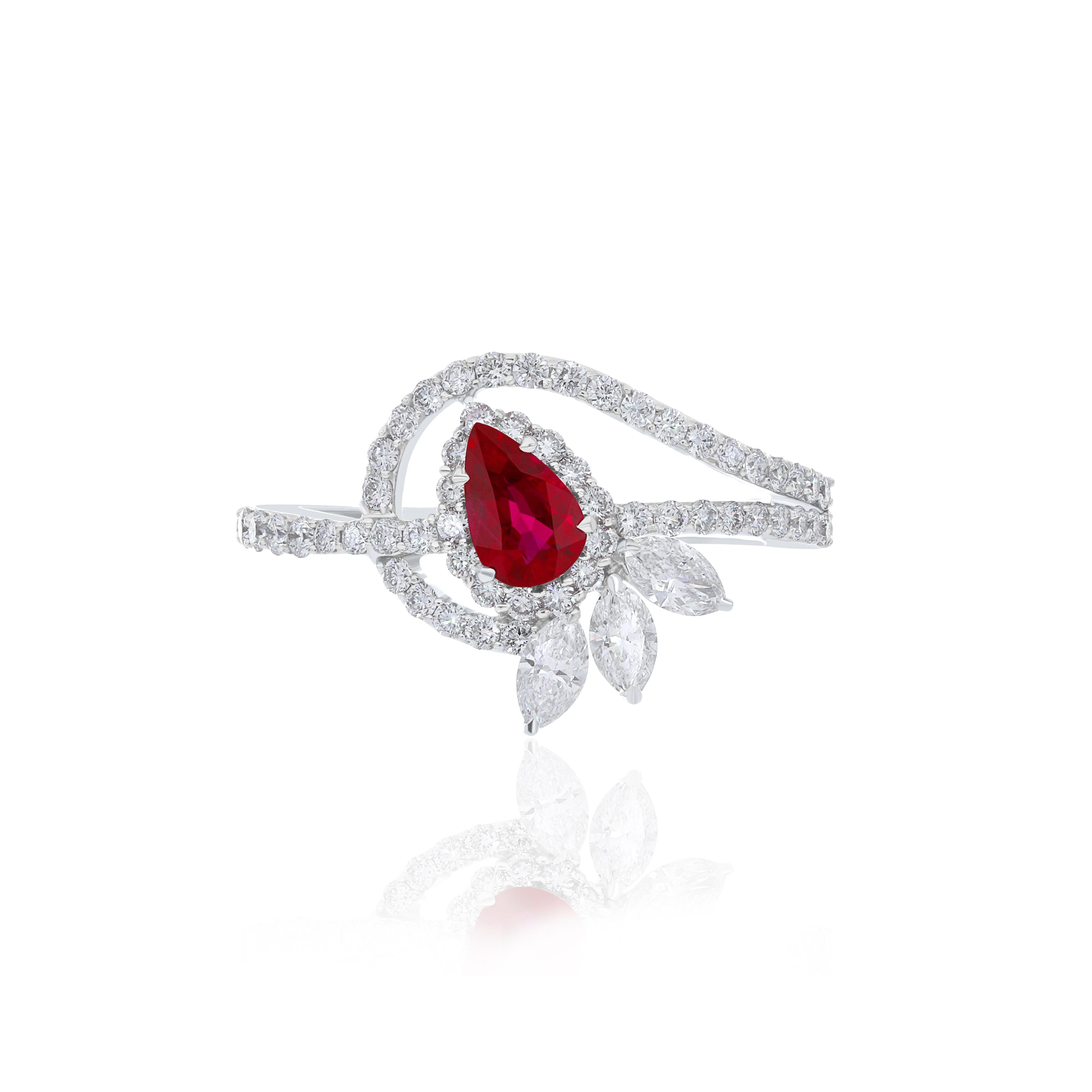 Elegant and exquisitely detailed 18 Karat White Gold Ring, center set with 0.45 Cts .Pear Shape Ruby Mozambique and micro pave set Diamonds, weighing approx. 0.81 Cts Beautifully Hand crafted in 18 Karat White Gold.

Stone Detail:
Ruby Mozambique: