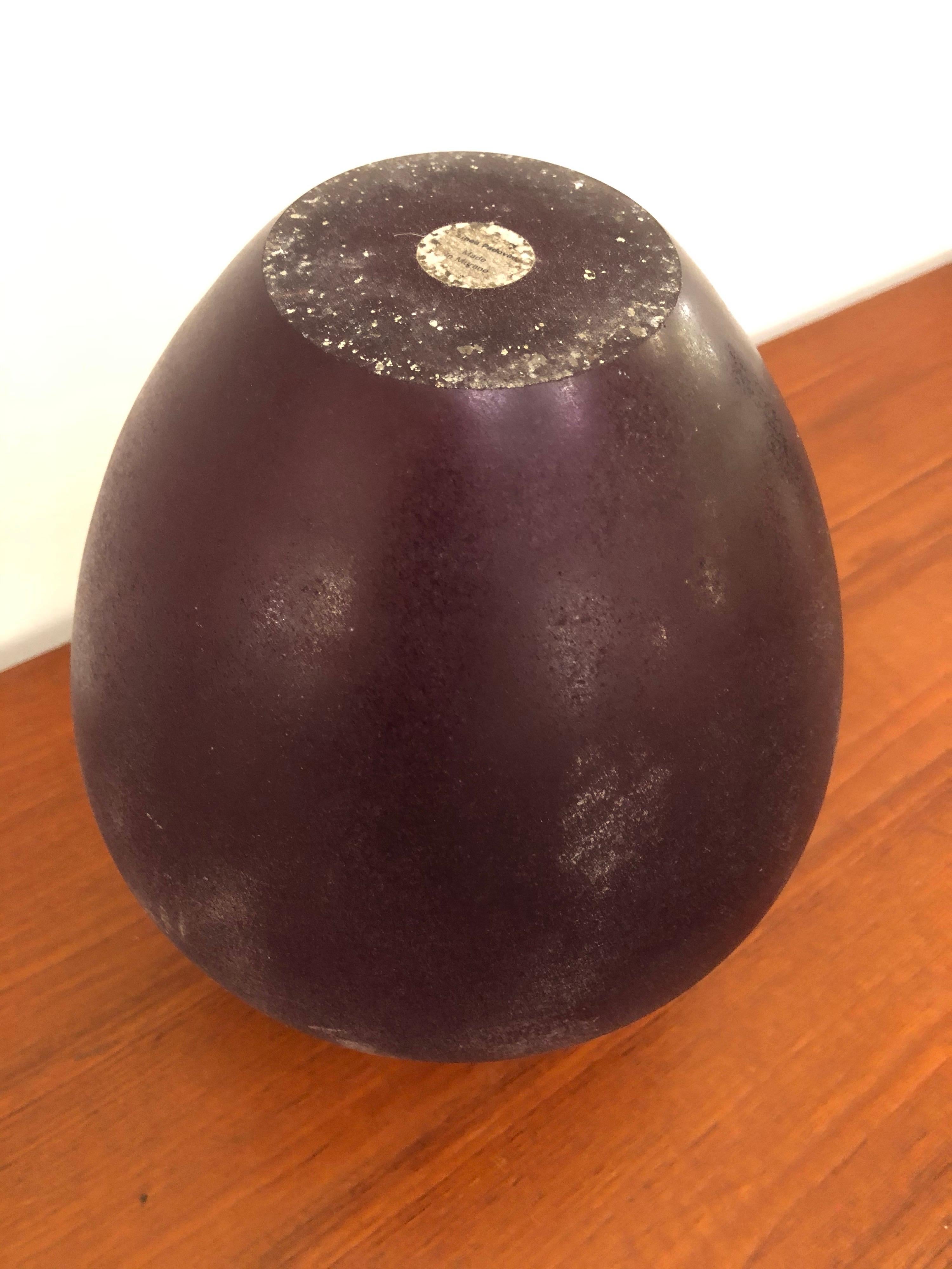 Delightful Murano glass vase, ruby color, produced by Linea Padovan during the 1960s.