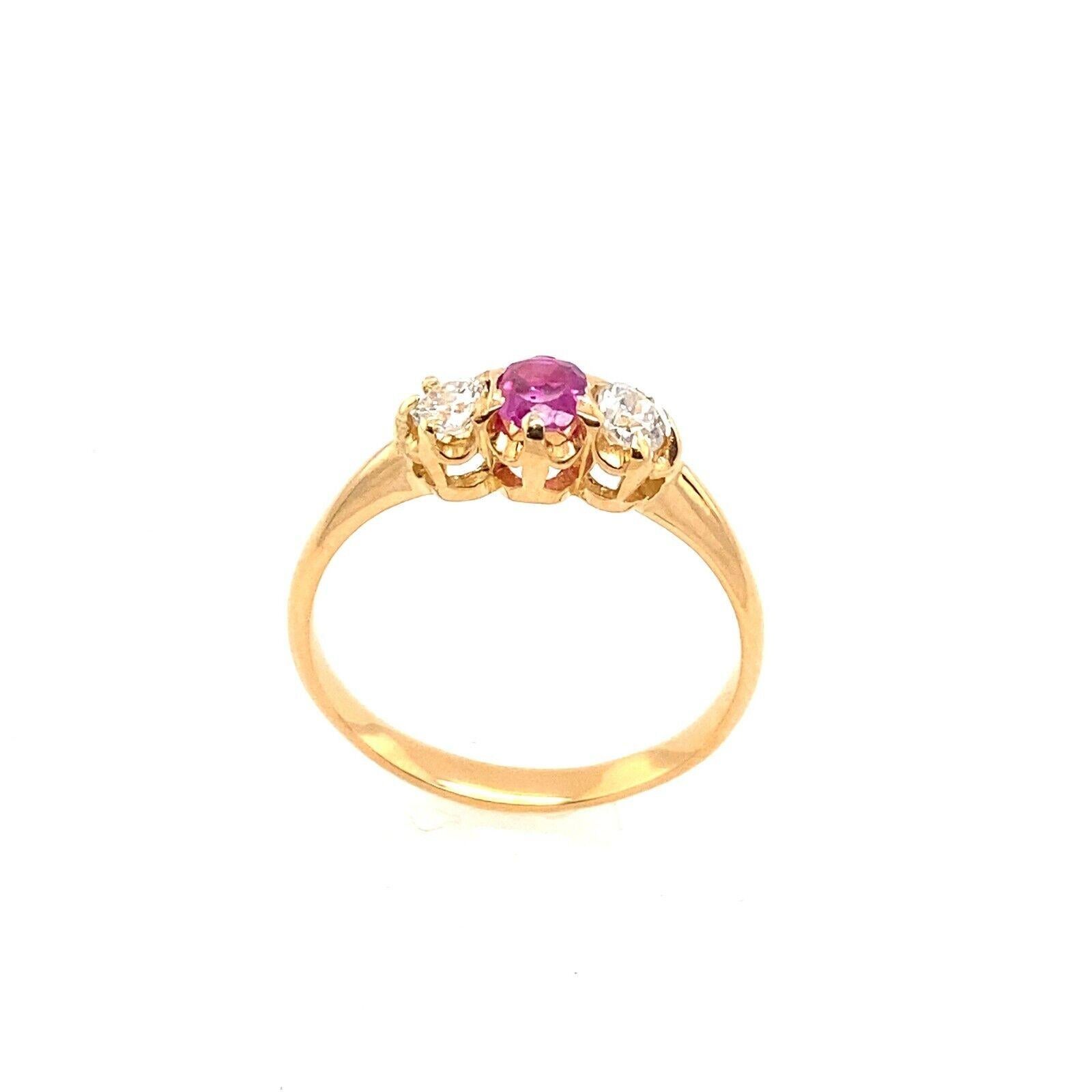 This stunning vintage three-stone ring features 2 natural Victorian cut diamonds
and an oval natural ruby The ring is set in 18ct rose gold. (Tested as 18ct gold).

Additional Information:
Total Weight: 2.5g
Total Diamond Weight: 0.25ct
Diamond