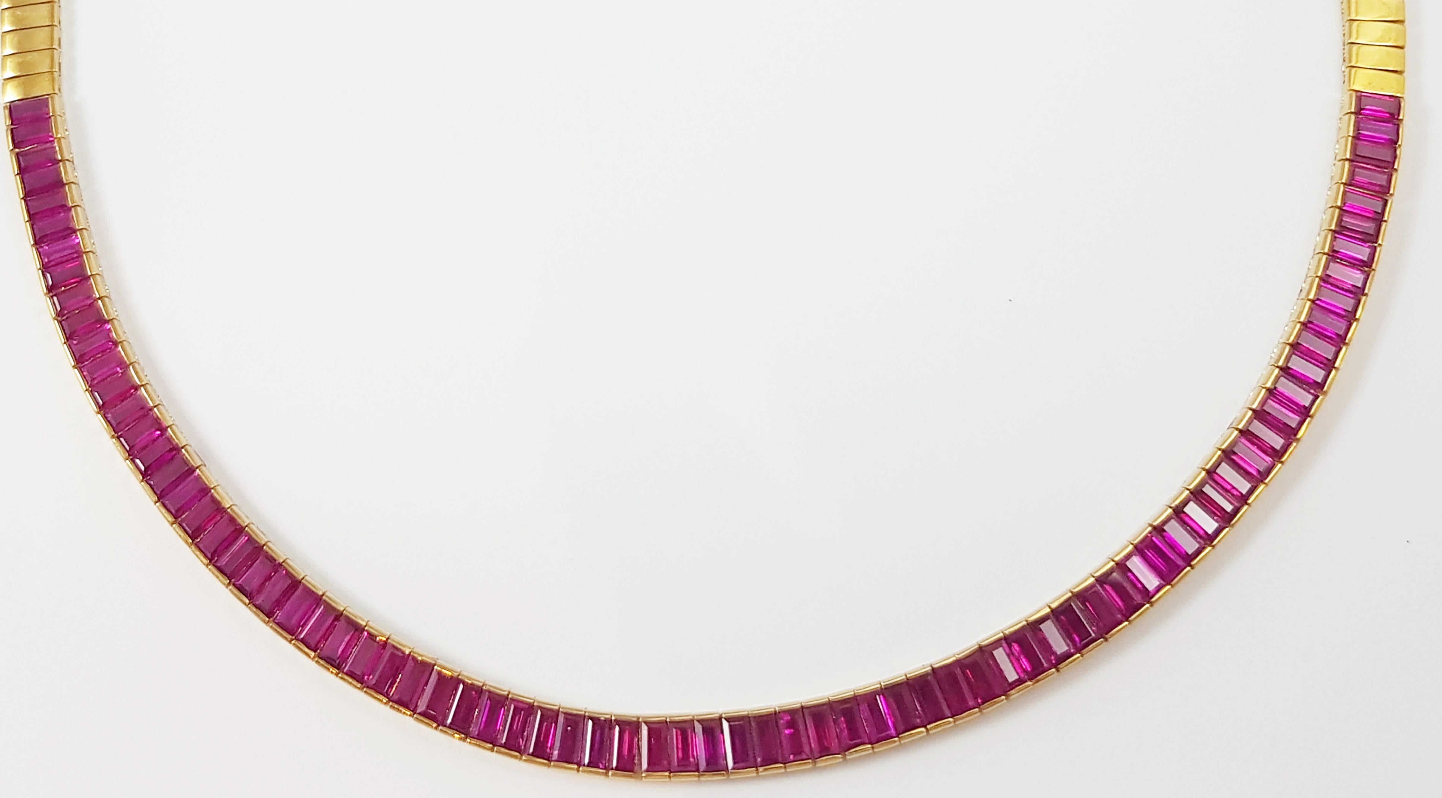 Ruby 12.07 carats Necklace set in 18 Karat Gold Settings

Width:  0.5 cm 
Length: 42.0cm
Total Weight: 43.13 grams

