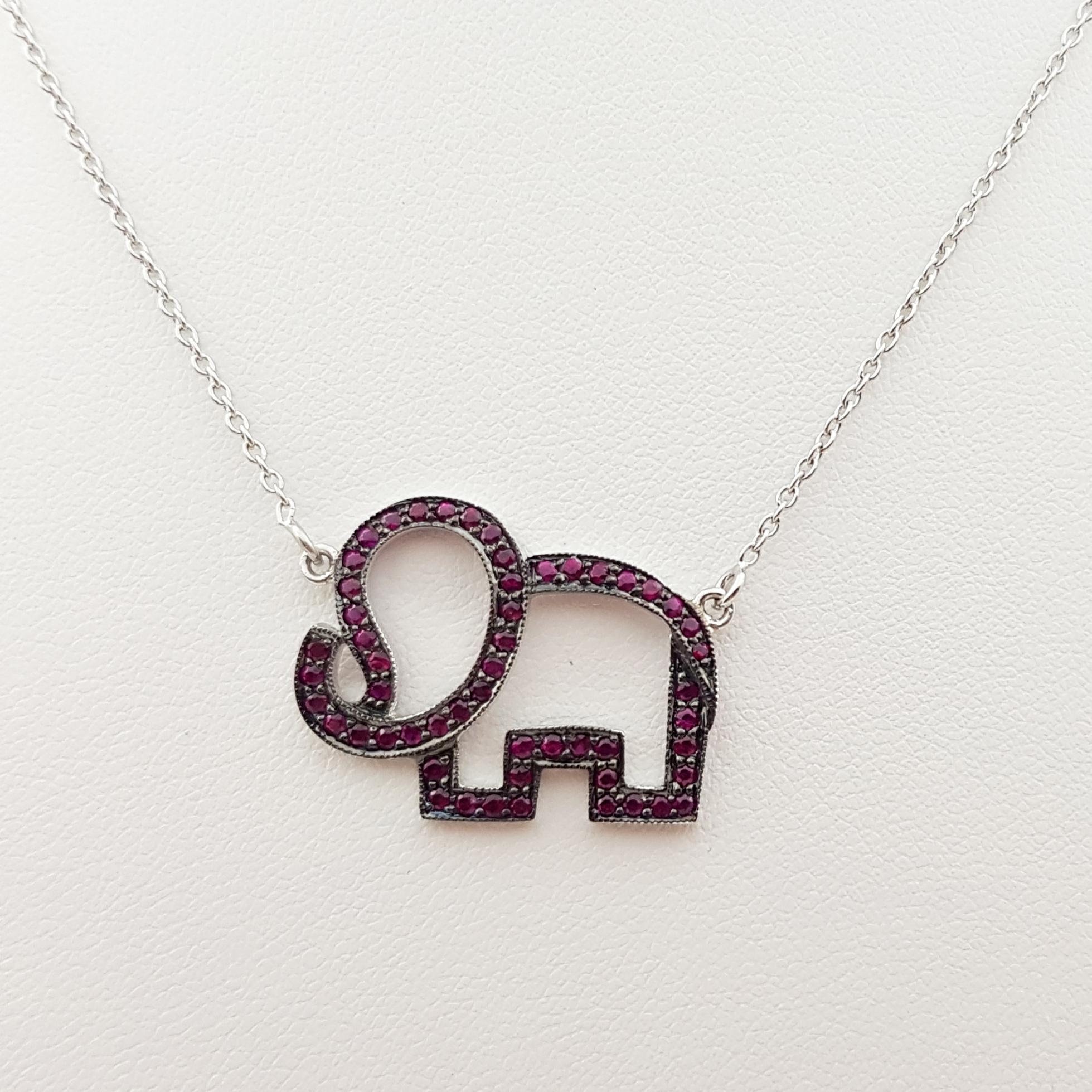Contemporary Ruby Elephant Necklace set in Silver Settings For Sale