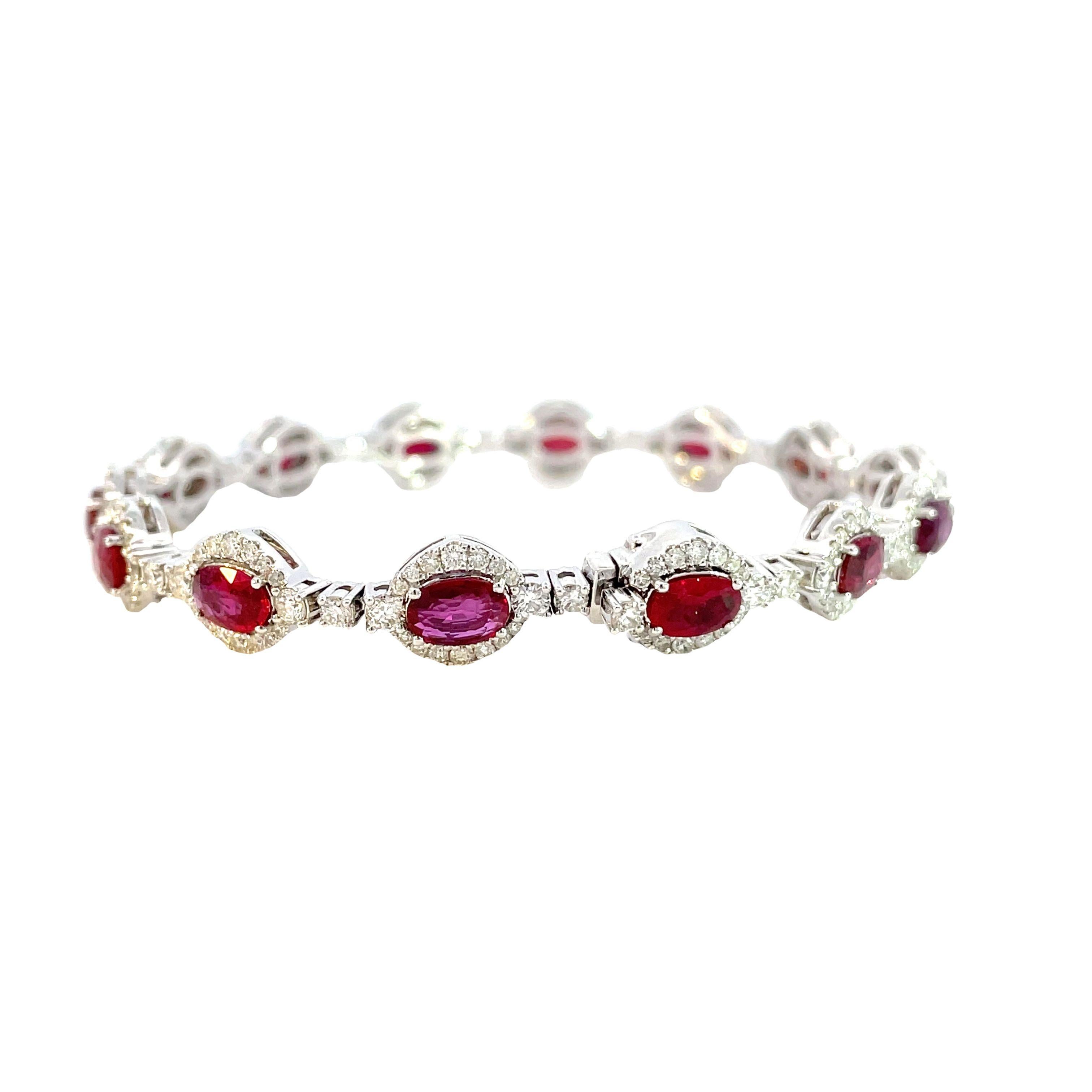 Radiant elegance meets timeless luxury in our Ruby Oval and White Diamond Round 14KW Bracelet. Featuring a stunning 8.53 carat oval-cut ruby surrounded by 2.90 carats of brilliant white diamonds, set in 14-karat white gold. Perfect for any occasion,