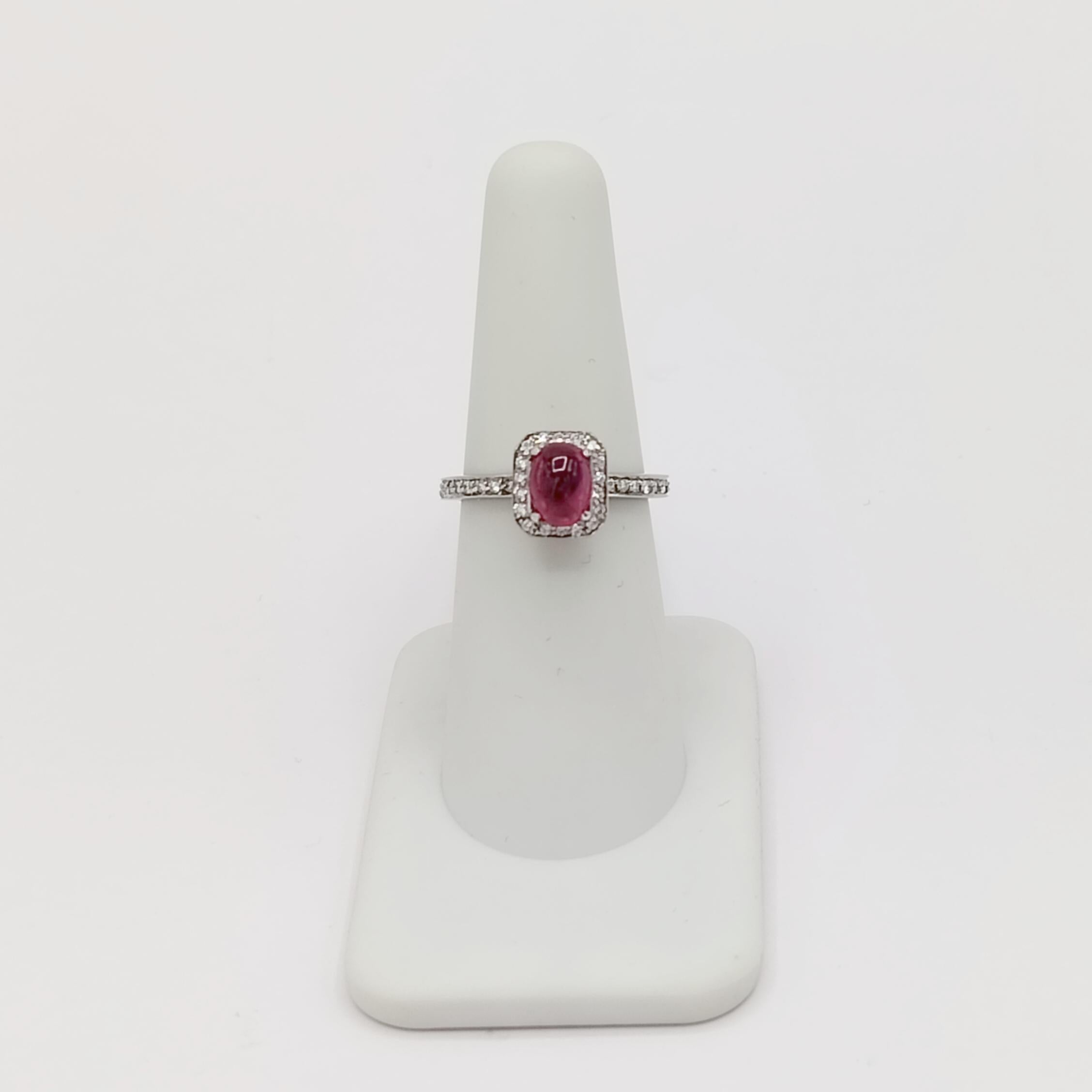 Ruby Oval Cabochon and White Diamond Ring in Platinum In New Condition For Sale In Los Angeles, CA
