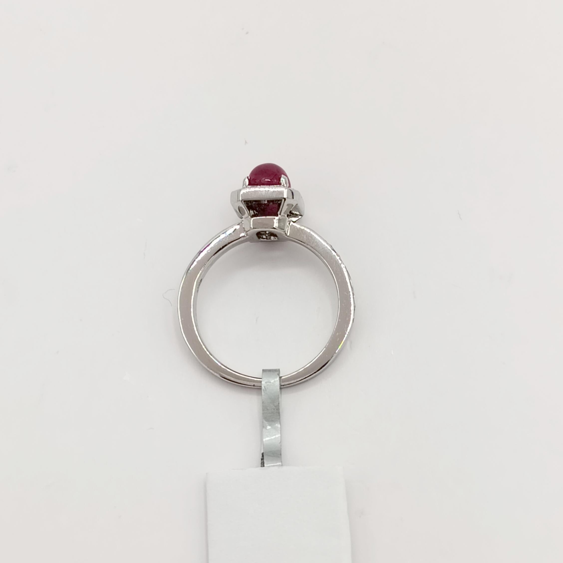 Women's or Men's Ruby Oval Cabochon and White Diamond Ring in Platinum For Sale