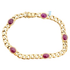 Bracelet en or jaune 18 carats avec cabochon ovale en rubis
