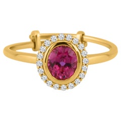 Bague ovale en or jaune 18 carats avec rubis et diamants