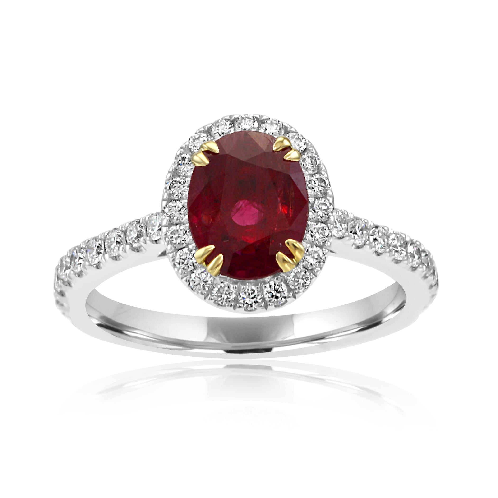 Stunning Ruby Oval 1.21 Carat encircled in a single halo of White G-H Color VS-SI Diamond Round 0.70 Carat set in gorgeous 14K White and Yellow Gold Classic always in style Fashion Cocktail Bridal Ring.

Total Weight 1.91 Carat