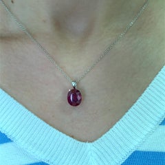 Ruby oval shaped pendant necklace 18k white gold