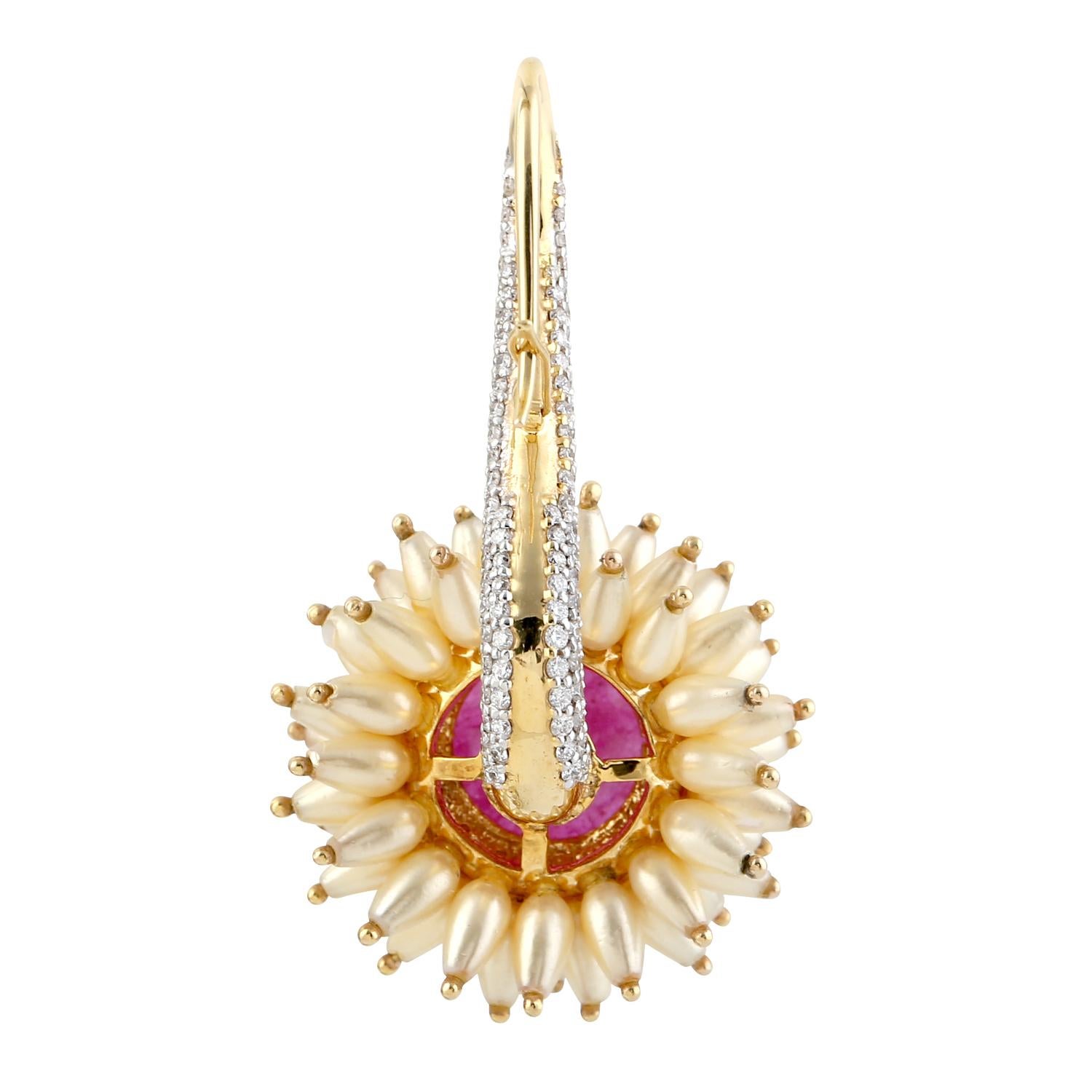 Cast from 18-karat gold.  These beautiful earrings are hand set with 13.25 carats ruby, 36.2 carats pearl and 3.12 carats of sparkling diamonds.

FOLLOW  MEGHNA JEWELS storefront to view the latest collection & exclusive pieces.  Meghna Jewels is