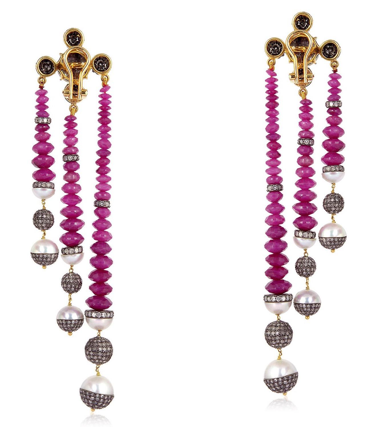 Handcrafted from 18-karat gold & Sterling Silver, these beautiful earrings are set in 78.0 carats ruby, 23.2 carats pearl and 7.99 carats of glimmering diamonds.

FOLLOW  MEGHNA JEWELS storefront to view the latest collection & exclusive pieces. 