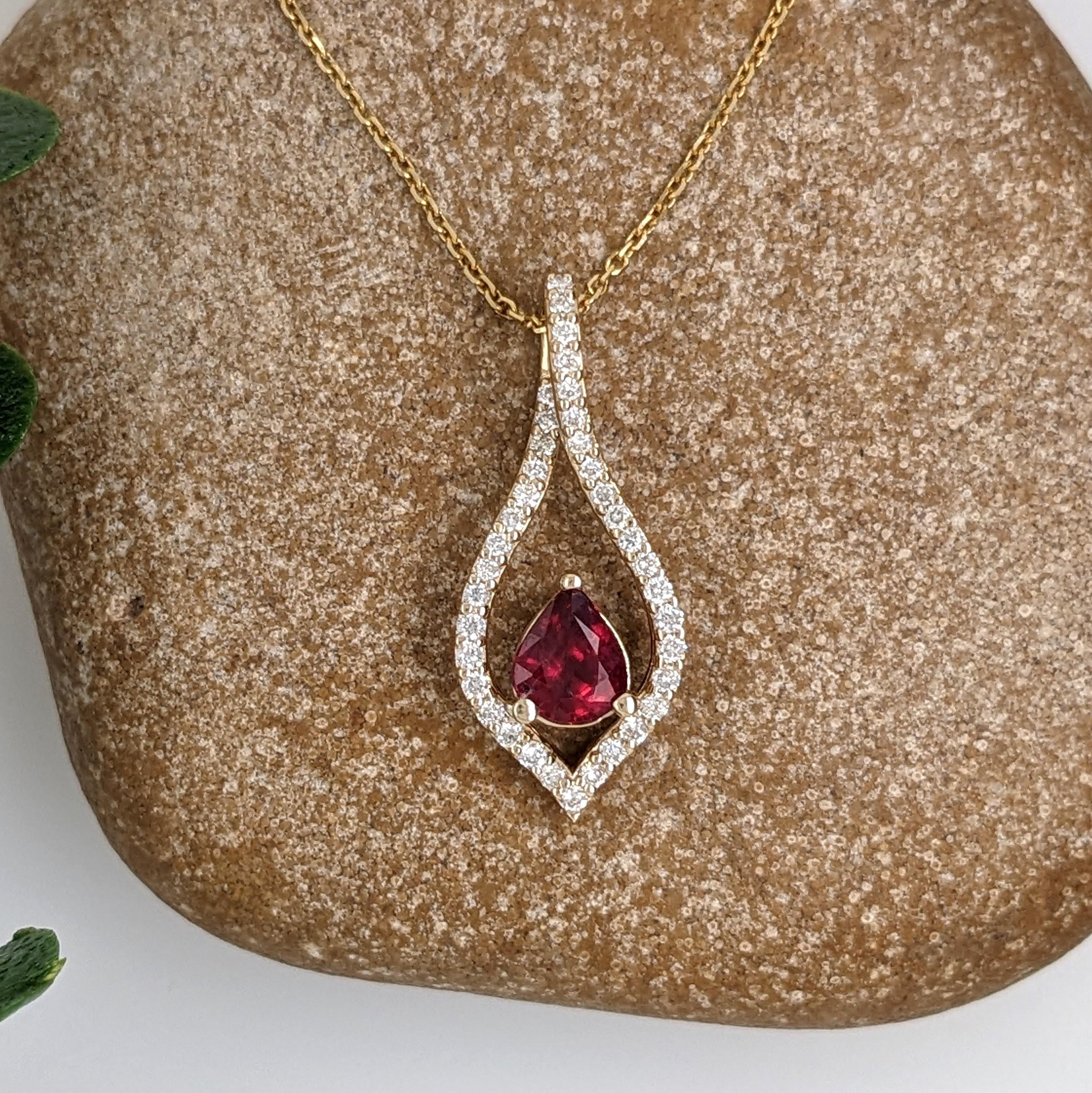 A gorgeous pendant featuring a 0.65 pear cut ruby from Mozambique all set in solid 14k yellow gold with all natural earth-mined diamonds. 

Specifications

Item Type: Pendant
Center Stone: Ruby
Treatment: Heated
Weight: 0.65ct
Head