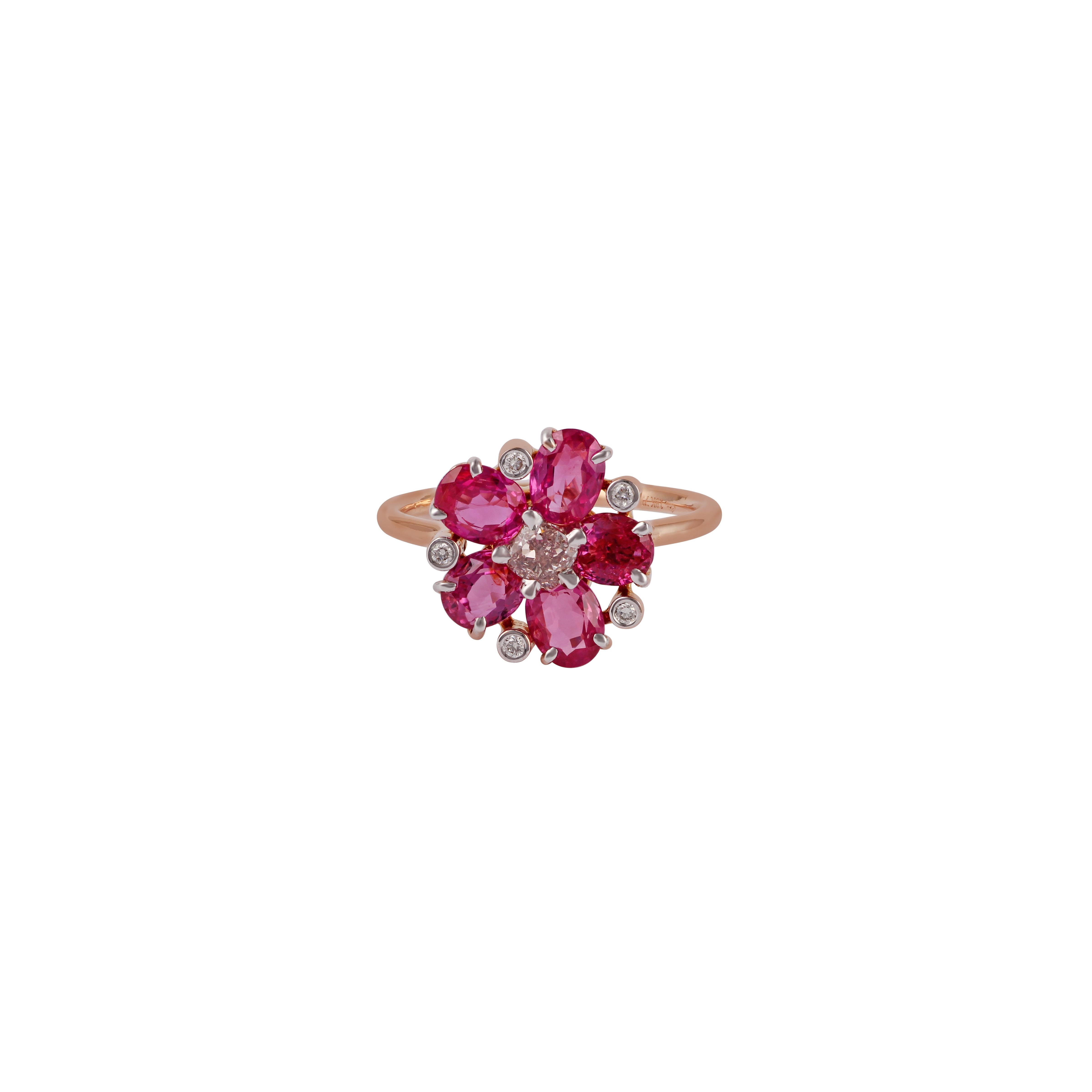 This is an exclusive ring studded in 18k rose gold with 5 pieces of oval shaped ruby weight 2.97 carat with 1 piece of pink diamond in the center weight 0.29 carat & 5 pieces of round shaped diamond weight 0.04 carat, this entire ring is studded in