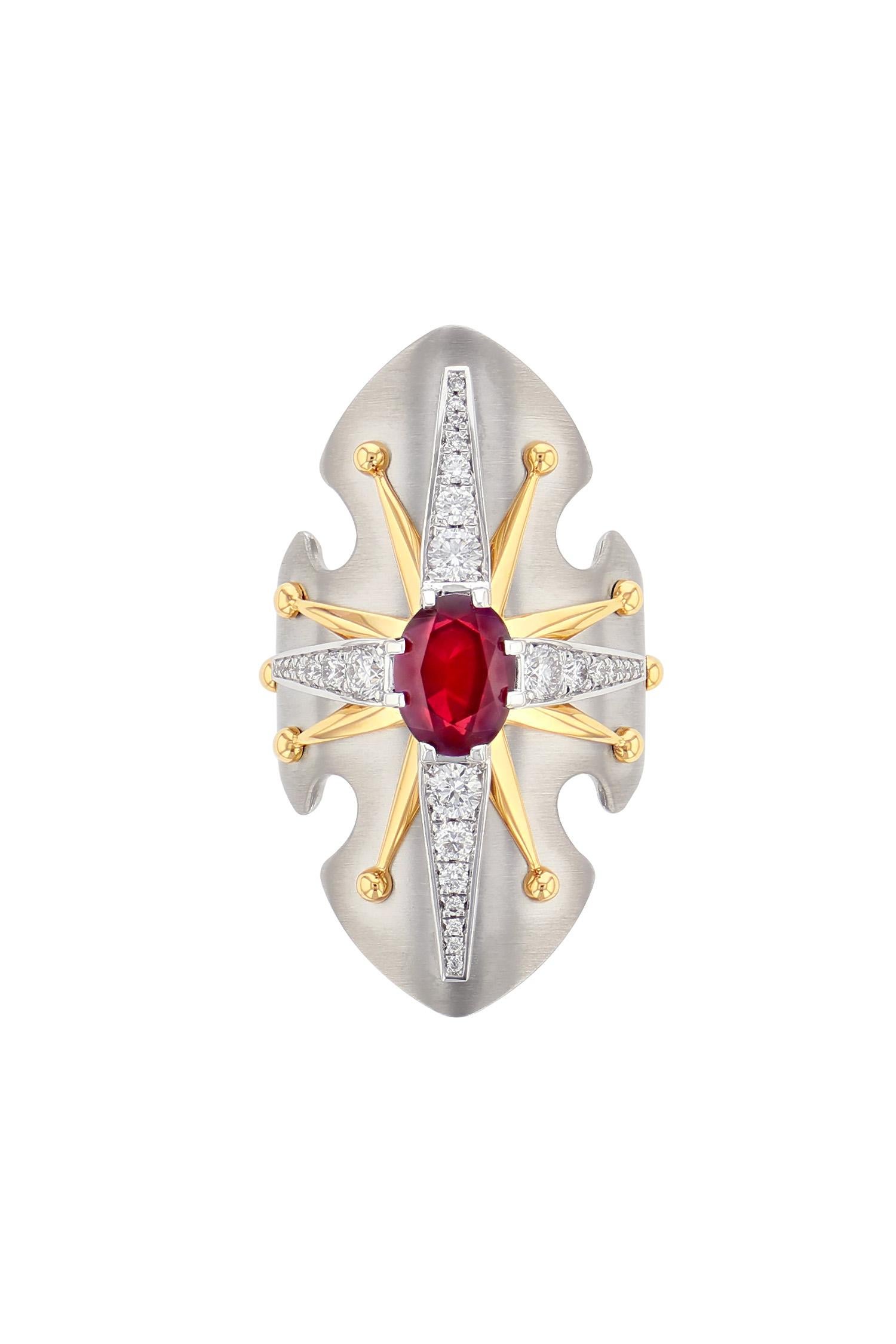 Platinum ring studded with an oval cut burmese rubis surrounded by diamonds and set on a white gold star.

Details: 
Certified Burmese Ruby: 2.46 cts  
Diamonds : 0.56 cts
18k Yellow  & Grey Gold : 4.16 g
Platinum : 16.67 g
Made in France