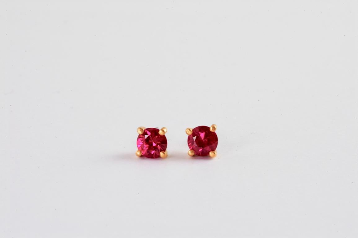 Platinum stud earrings with rubies 1.12ct total (22ct gold claws)