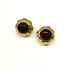 Ruby poured glass and gilt metal earrings, Goossens for Chanel, France, 1960s.