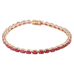 11.97ct Oval Ruby Yellow Gold Tennis Bracelet